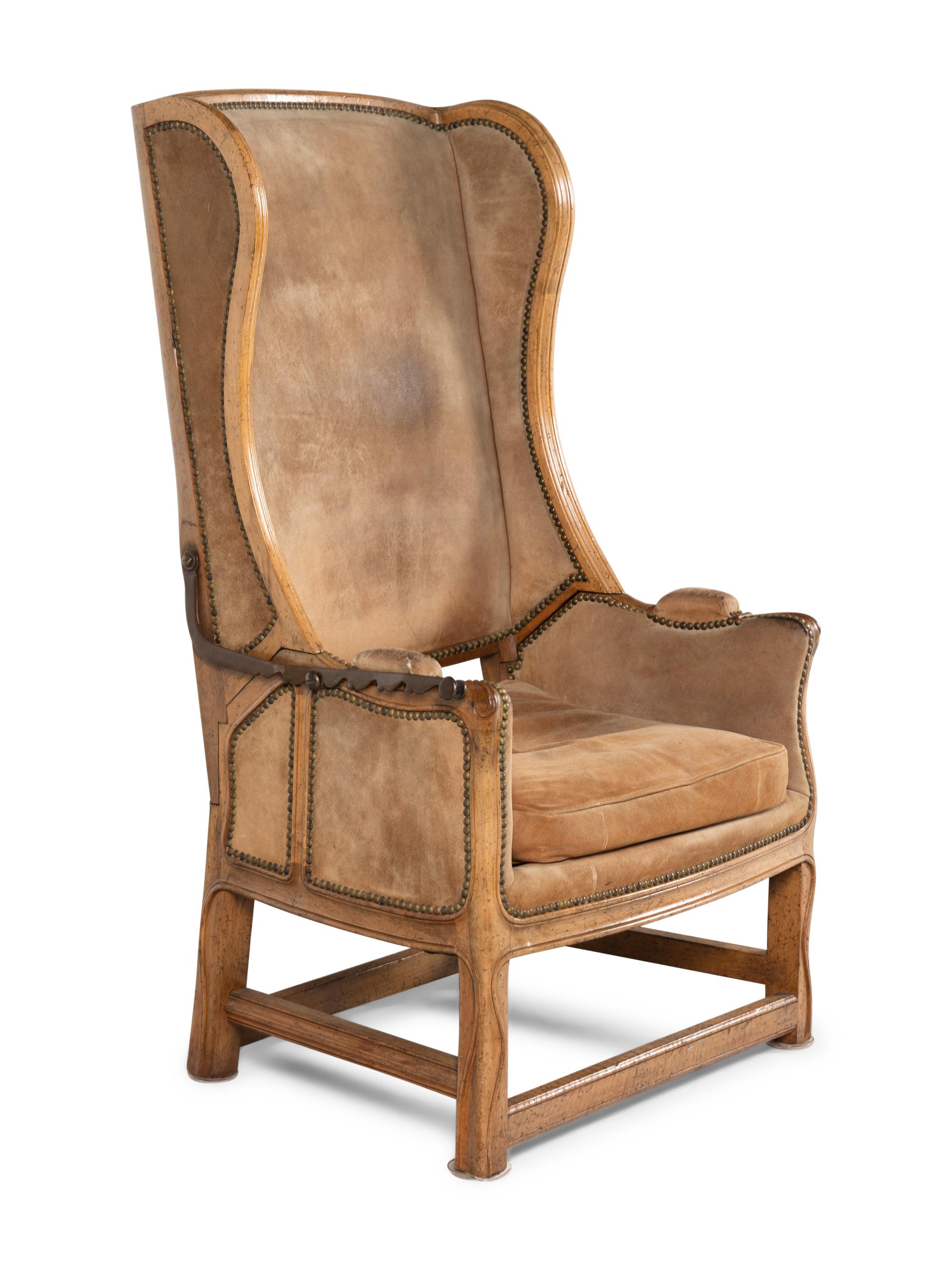 A Louis XV Provincial Style Carved Reclining Easy Chair