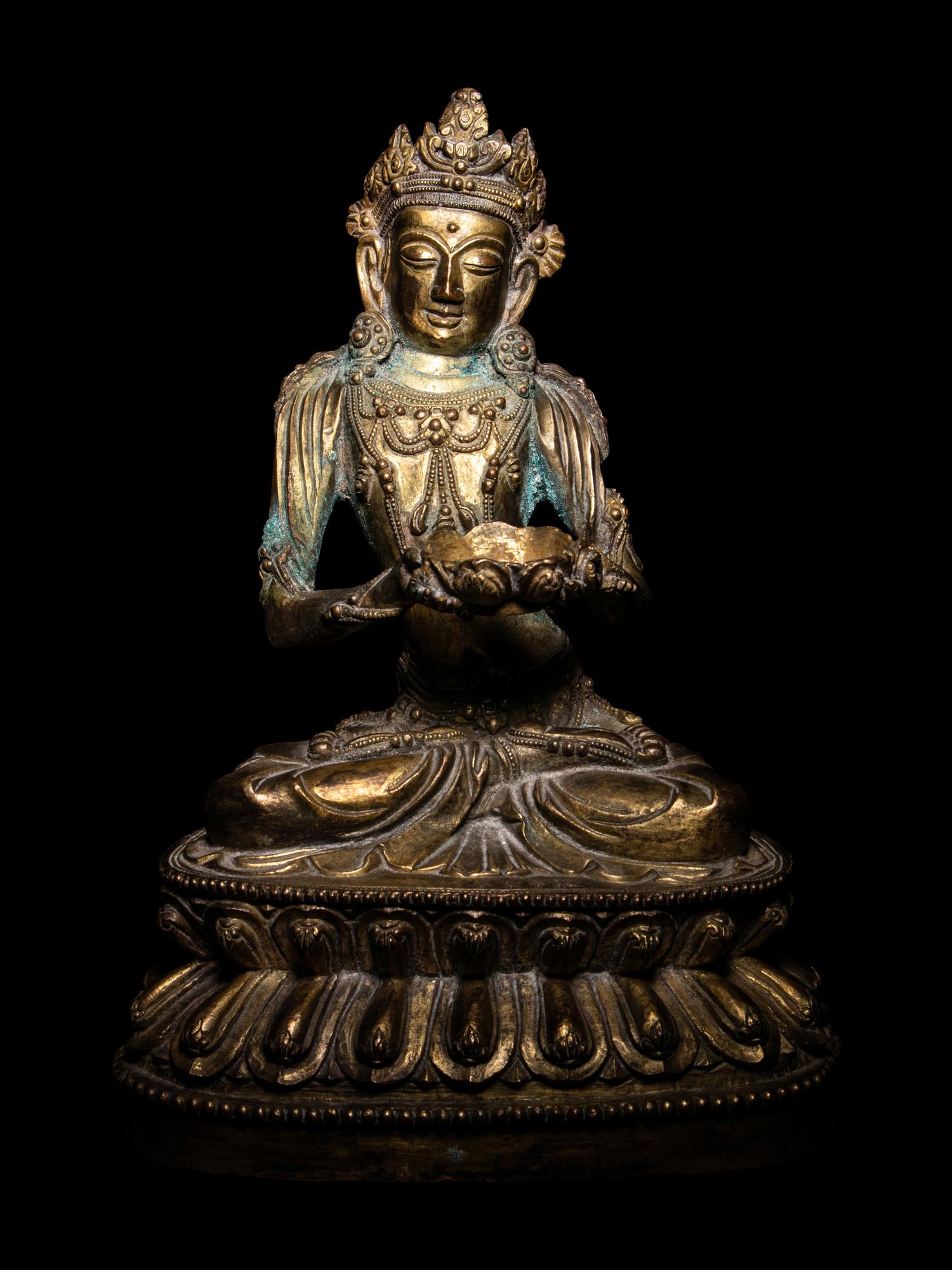 An Unusual Gilt Bronze Figure of Seated Maitreya