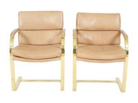 A Set of Twelve Gilt Steel Dining Chairs with Leather Upholstery