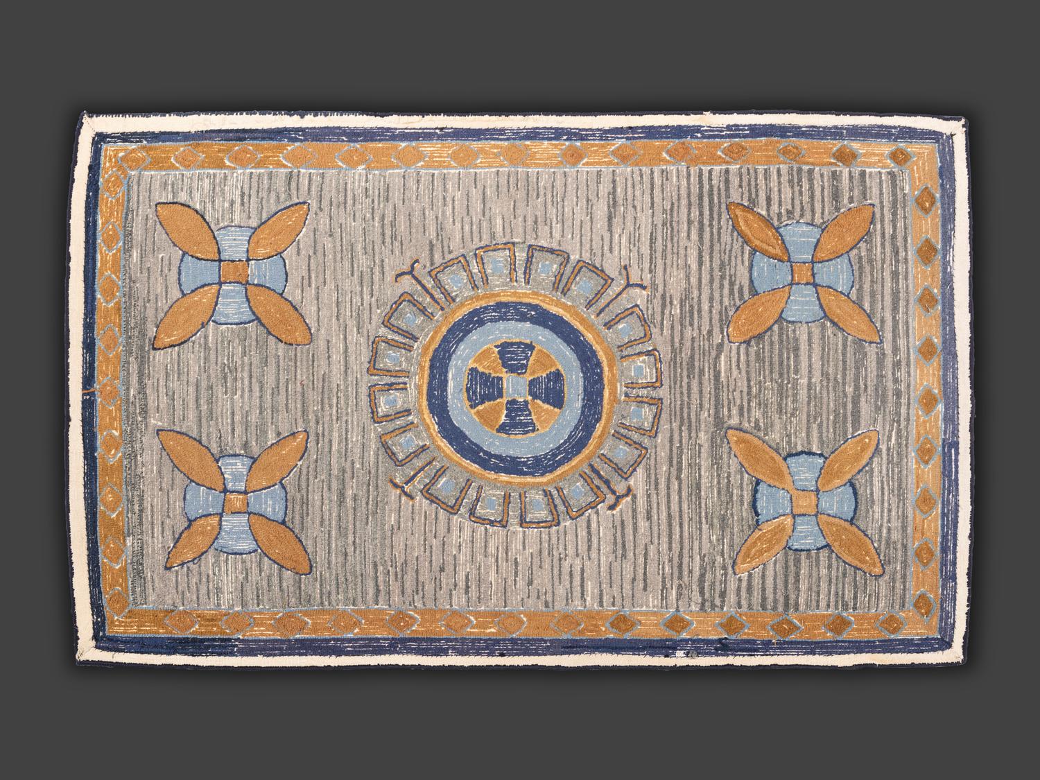 An American Medallion and Sand-Dollar Hooked Rug