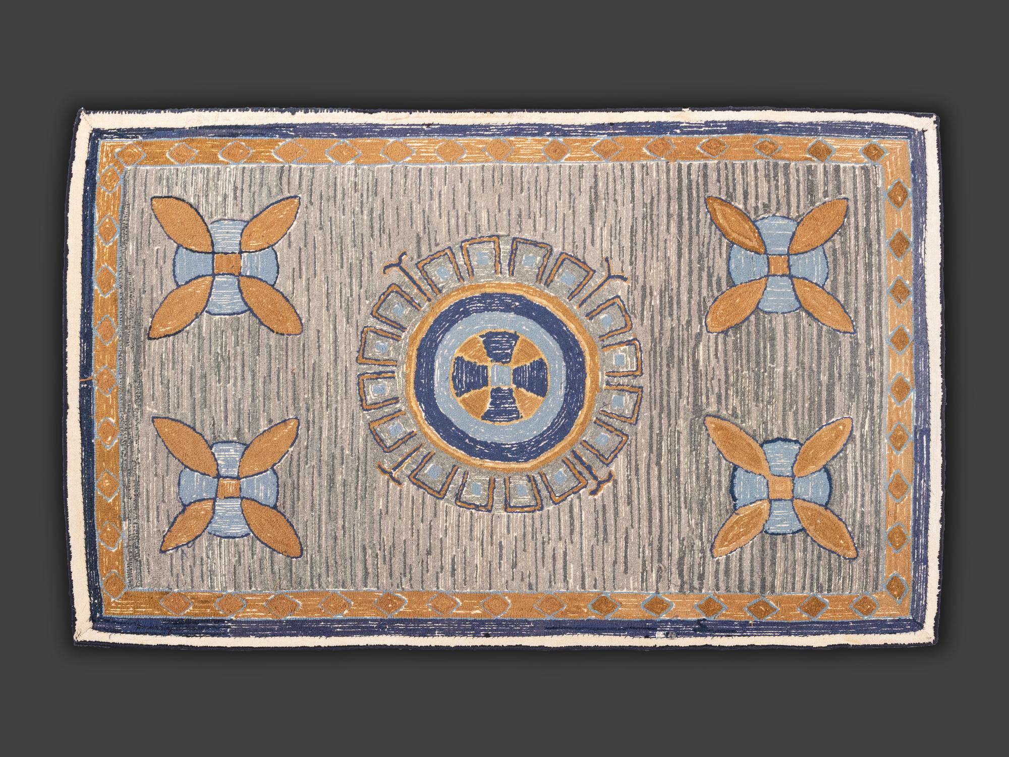 An American Medallion and Sand-Dollar Hooked Rug