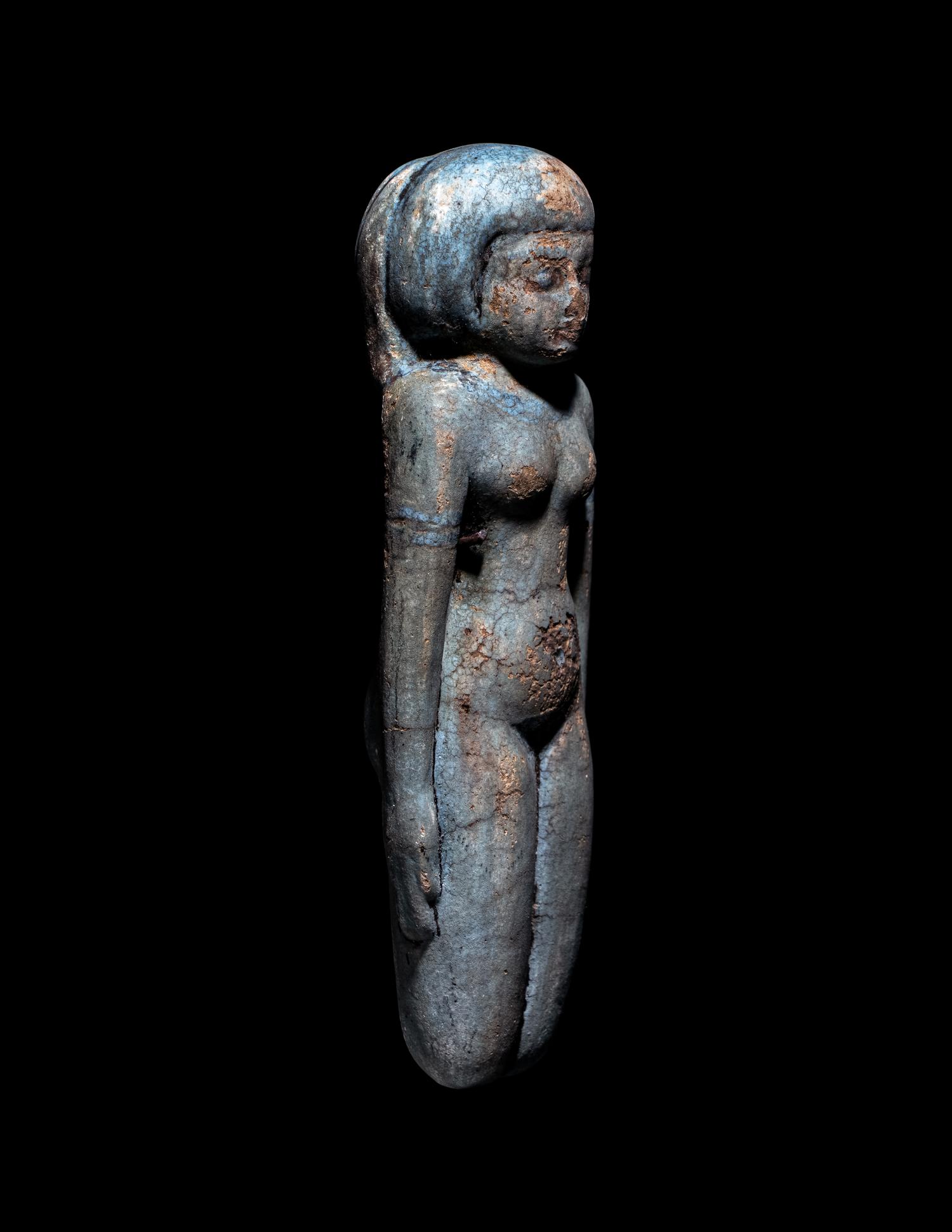 An Egyptian Faience Female Figure