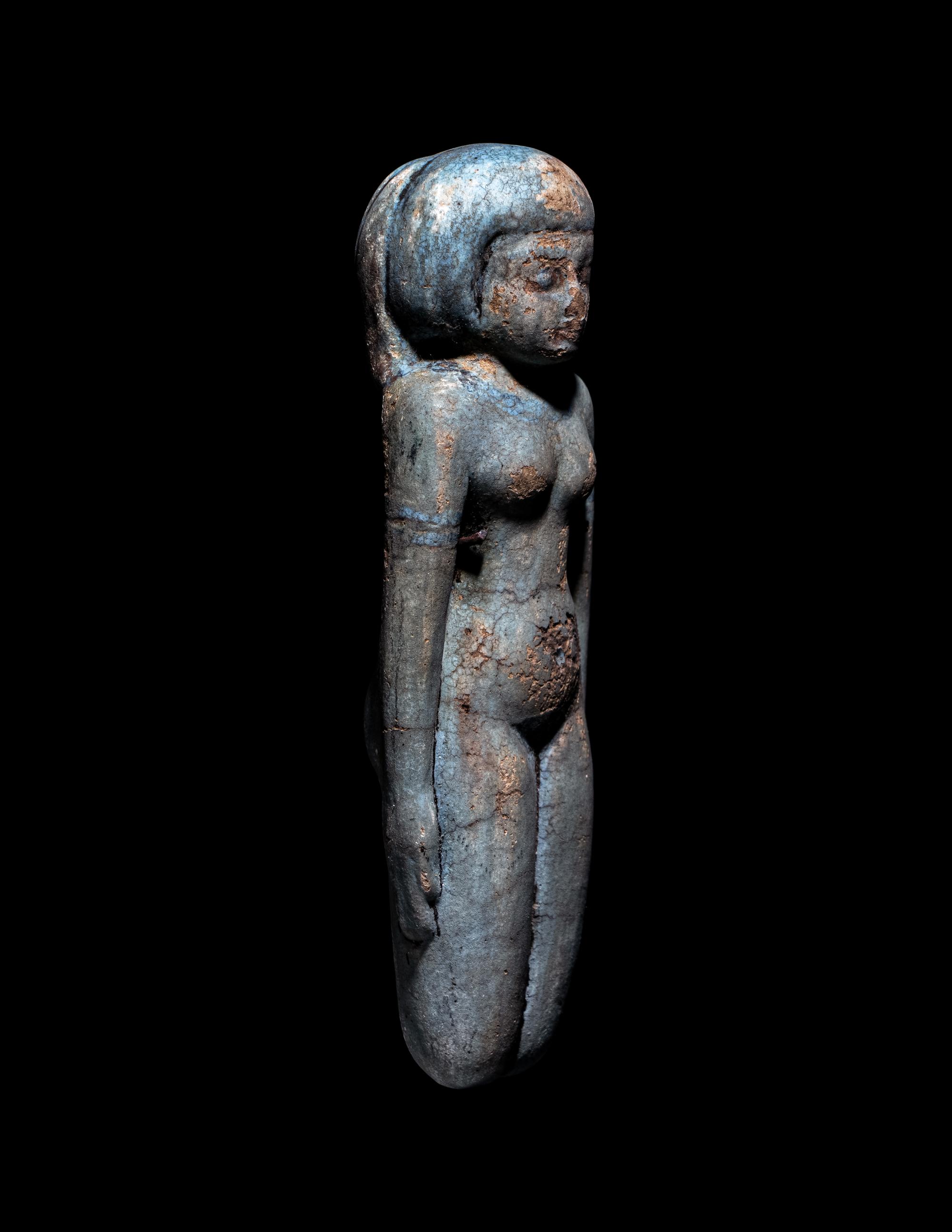An Egyptian Faience Female Figure