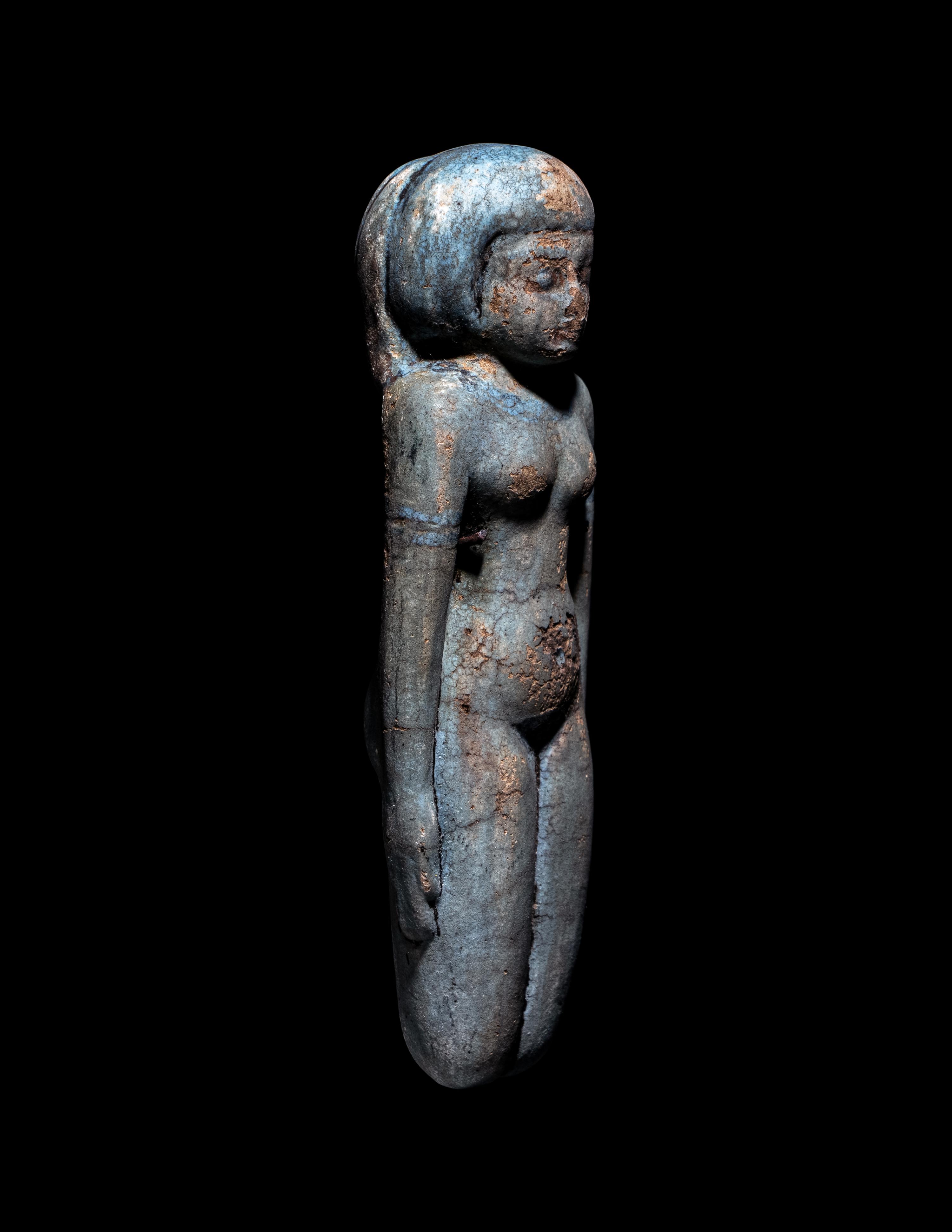 An Egyptian Faience Female Figure