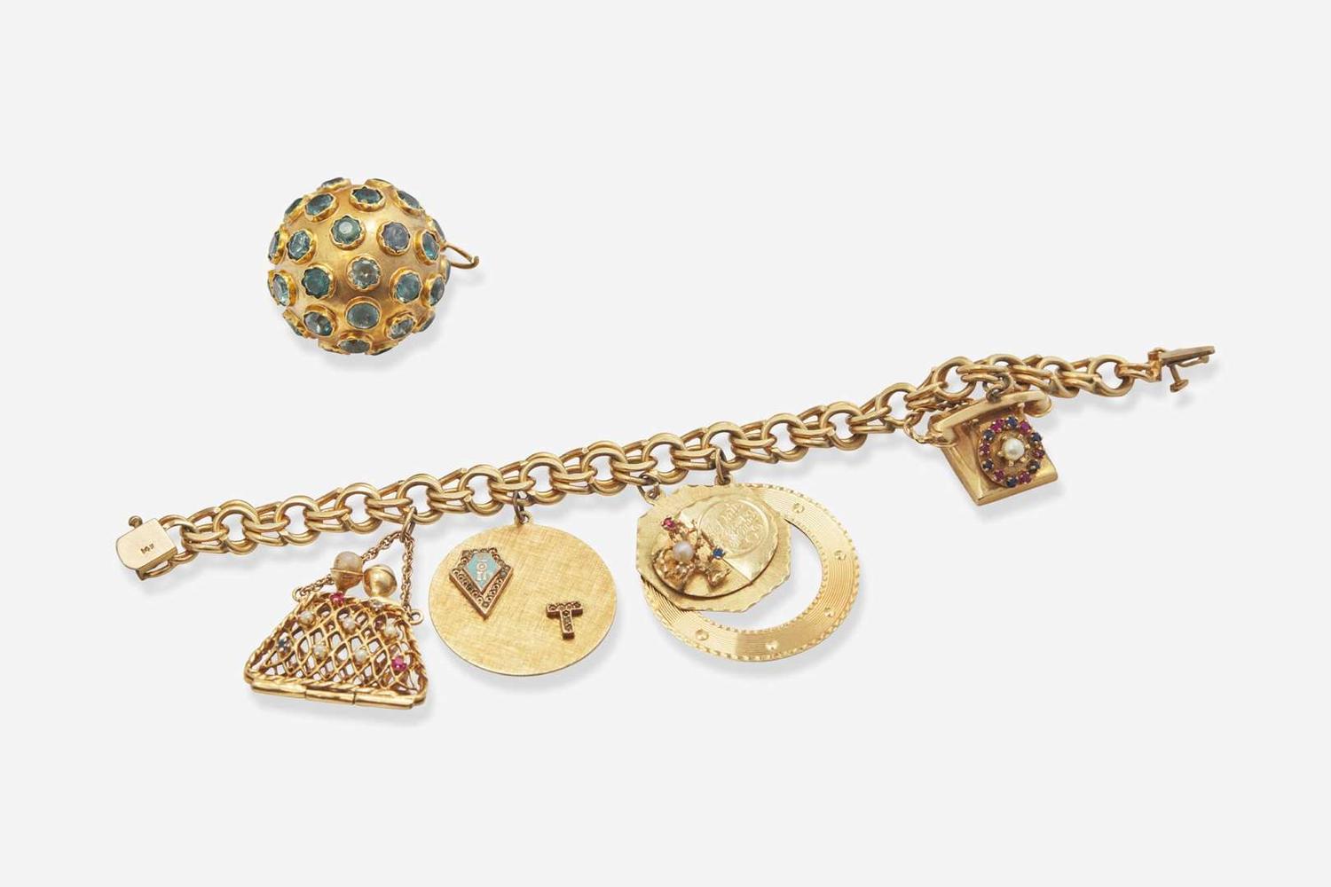 A Ladies 14K Yellow Gold Charm Bracelet