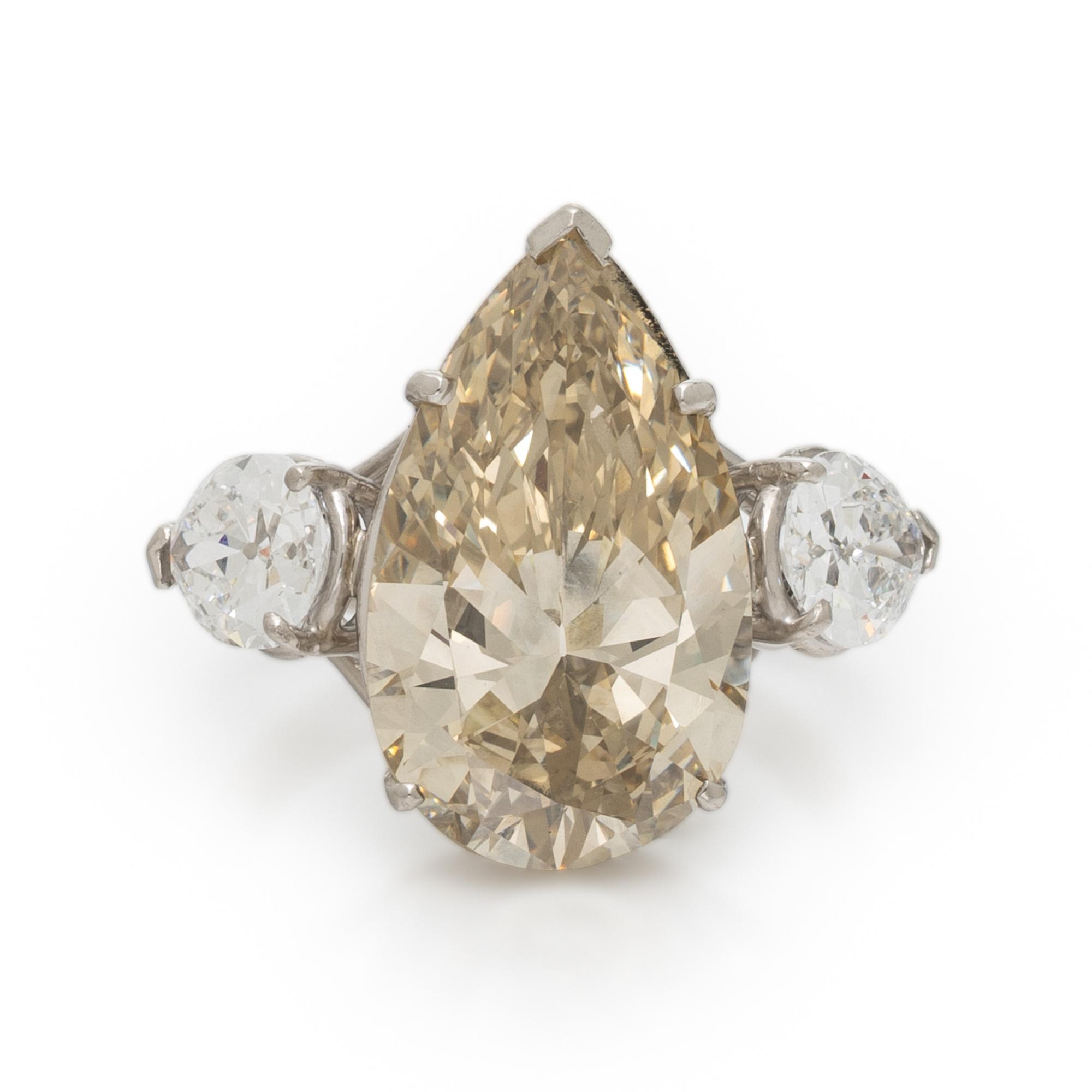NATURAL FANCY BROWNISH YELLOW PEAR SHAPED DIAMOND AND DIAMOND RING