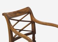 A Pair and Two Similar Federal Carved Mahogany Armchairs