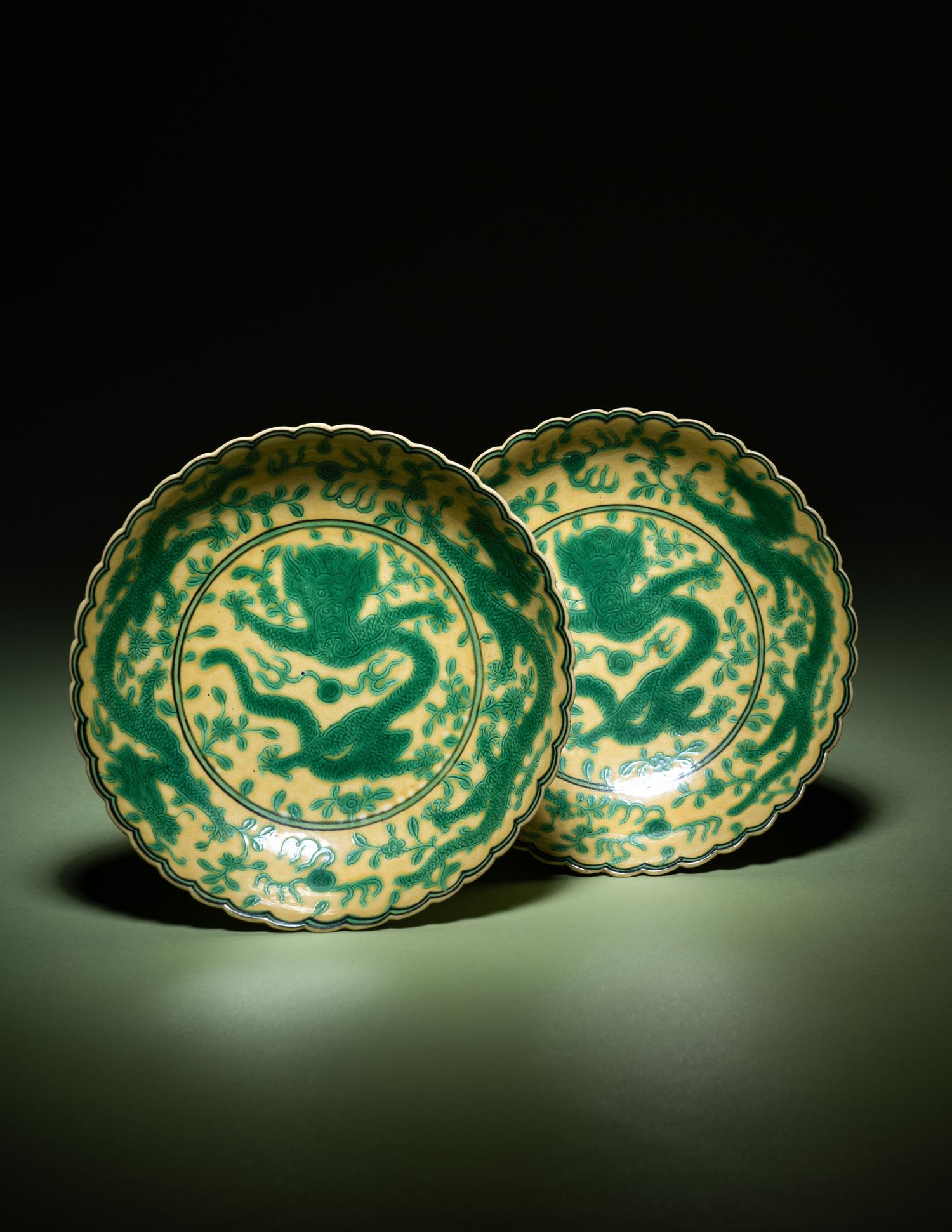 A Pair of Green Enameled Yellow Ground Glazed Incised 'Dragon' Dishes