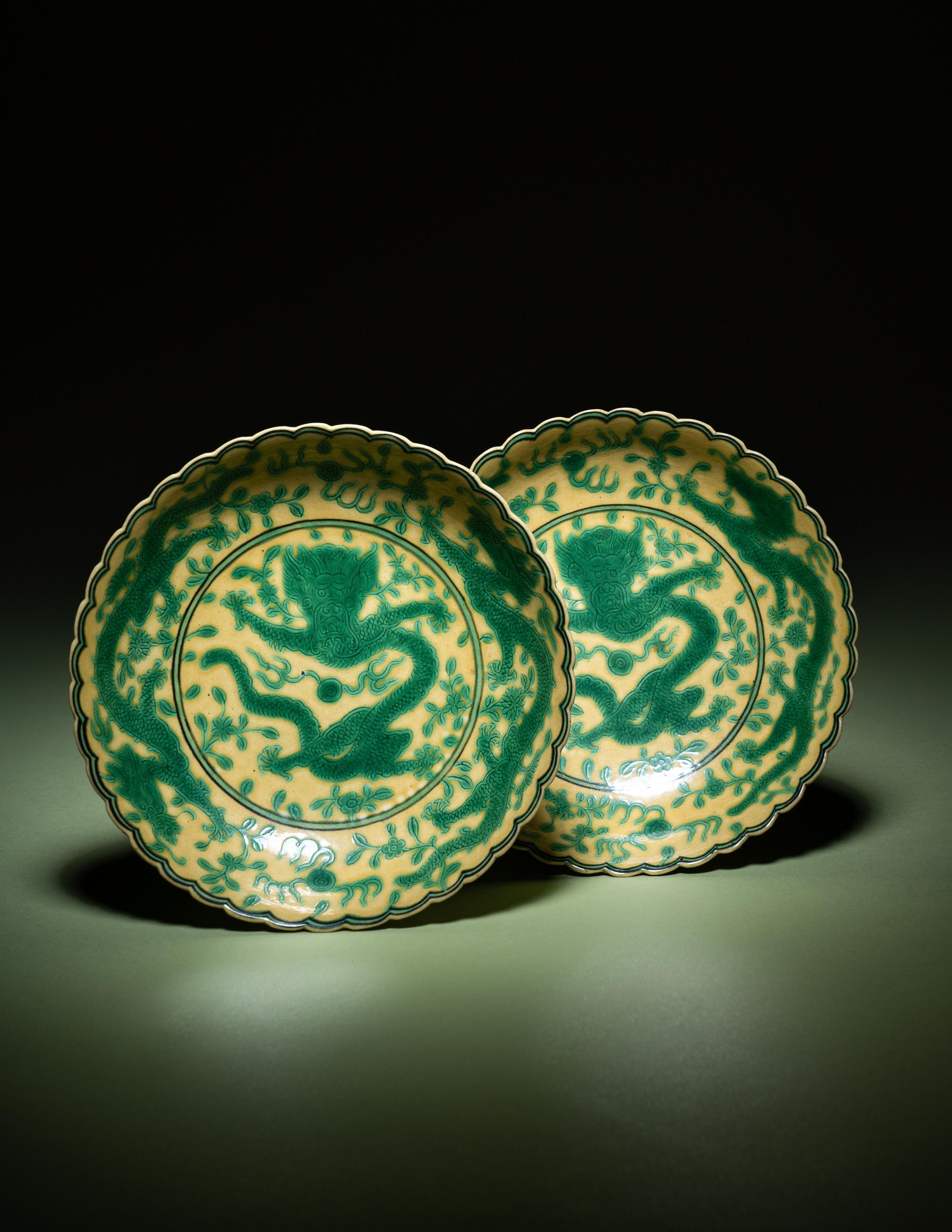 A Pair of Green Enameled Yellow Ground Glazed Incised 'Dragon' Dishes