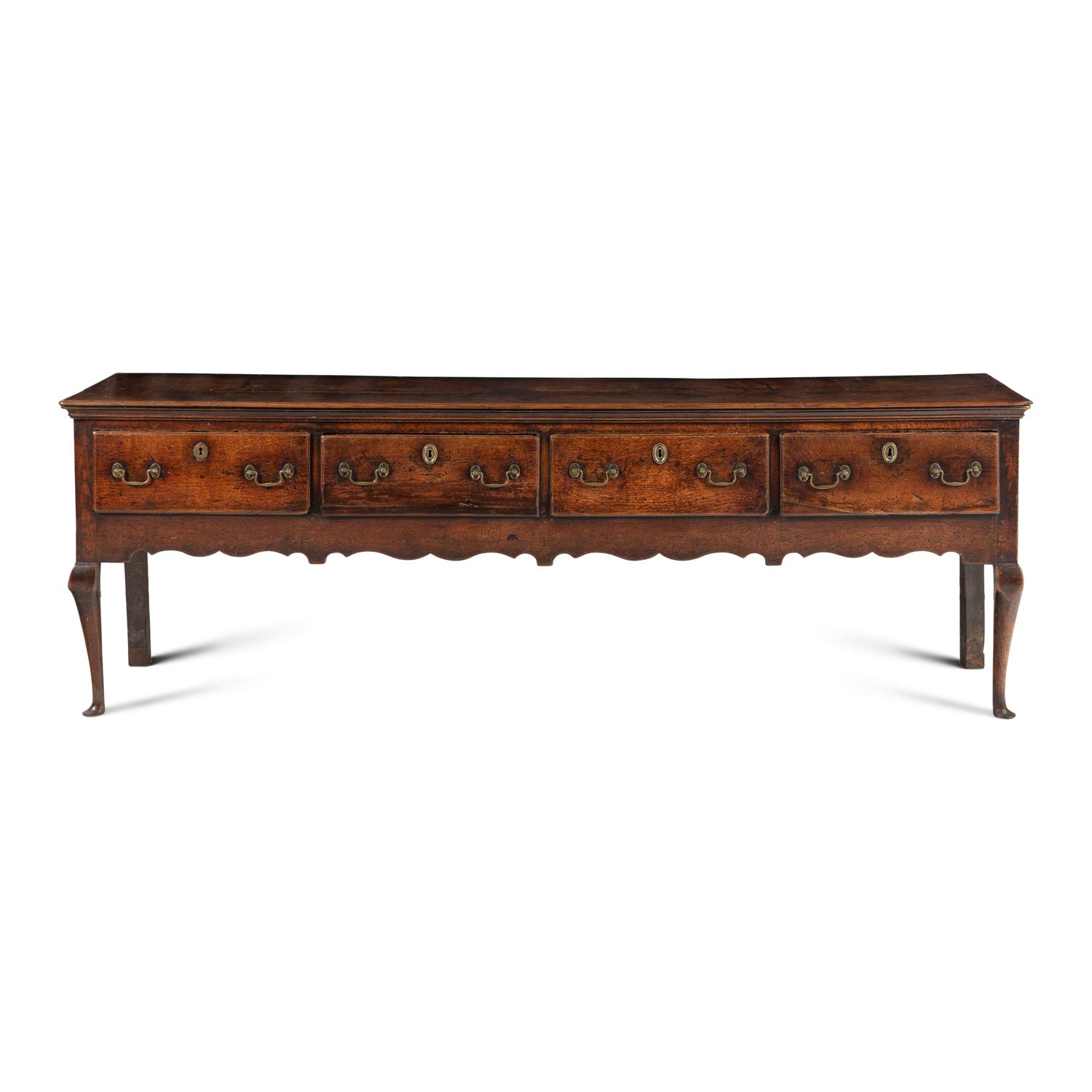 A Queen Anne Oak Four-Drawer Dresser