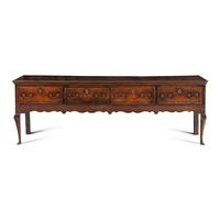 A Queen Anne Oak Four-Drawer Dresser