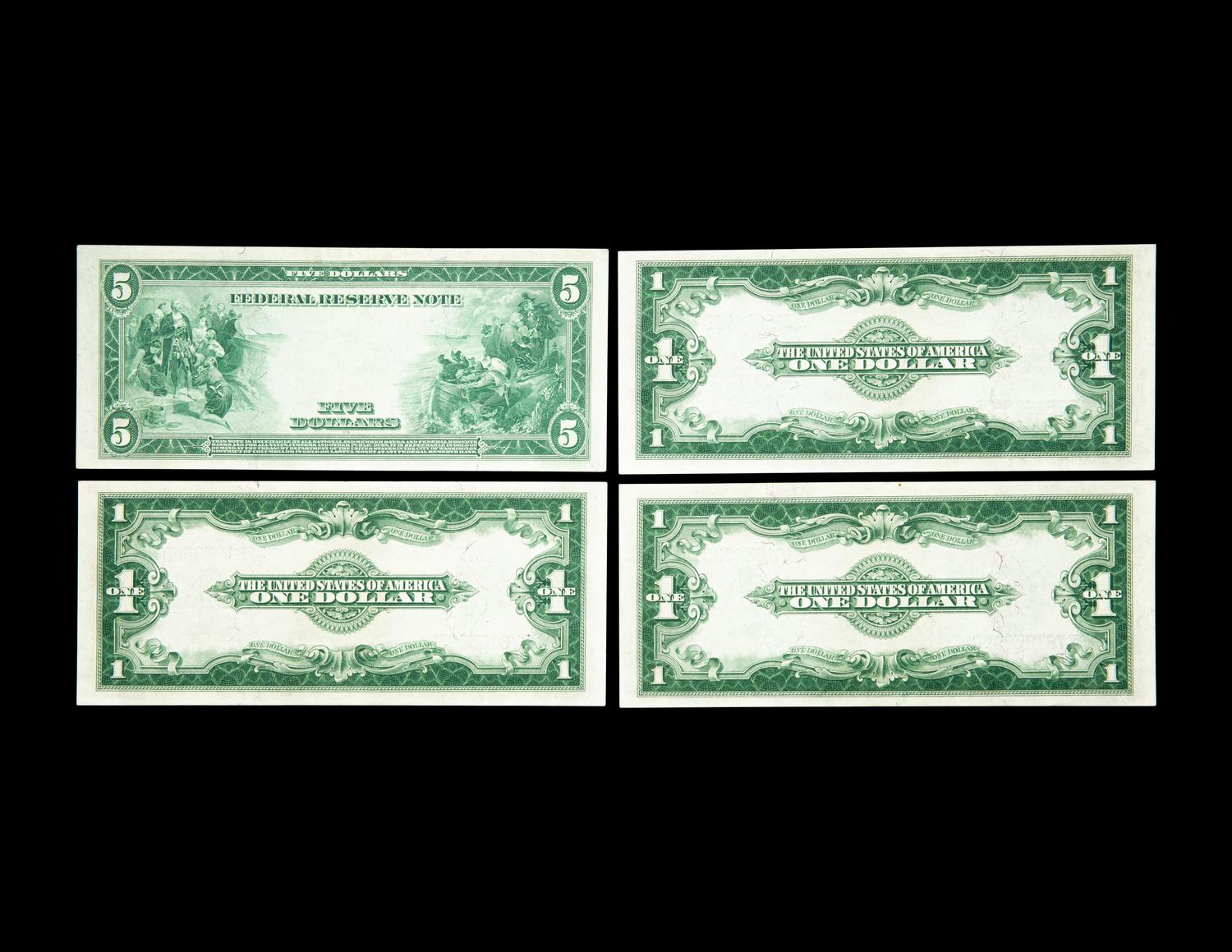 A Group of Four Large-Size Silver Certificates