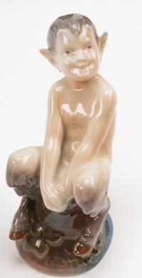 A Group of Nine Royal Copenhagen Porcelain Figures