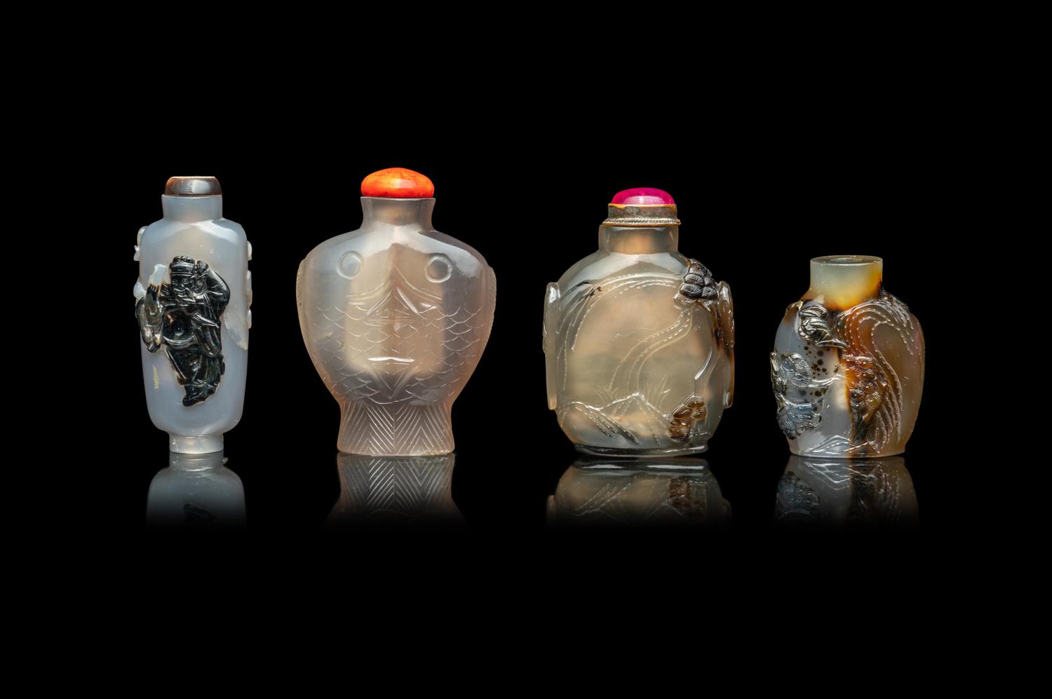 Four Chinese Carved Grey Agate Snuff Bottles