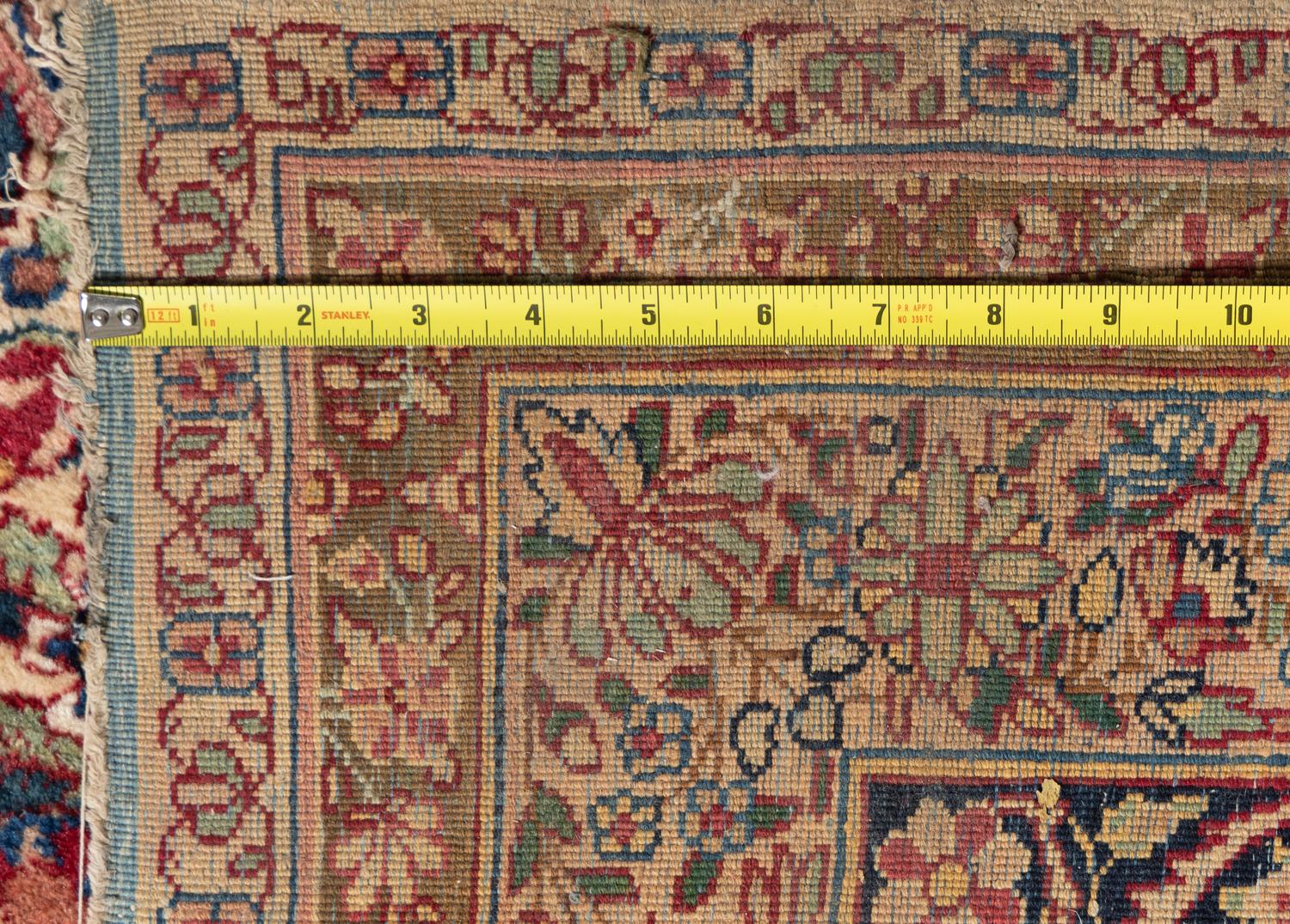 A Kashan Wool Rug
