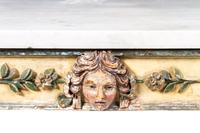 A Continental Cream and Green Painted Center Table Height 33 1/4 x width 54 x depth 25 1/4 inches. — 18TH CENTURY