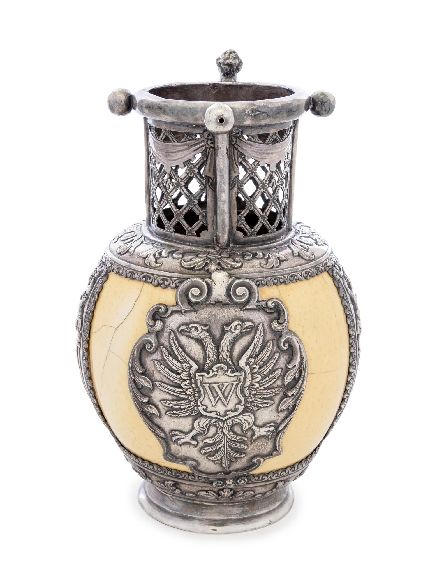An Austrian Silver Mounted Ostrich Egg Puzzle Jug