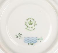 A Set of Twenty-Nine Royal Copenhagen Flora Danica Porcelain Cups and Saucers