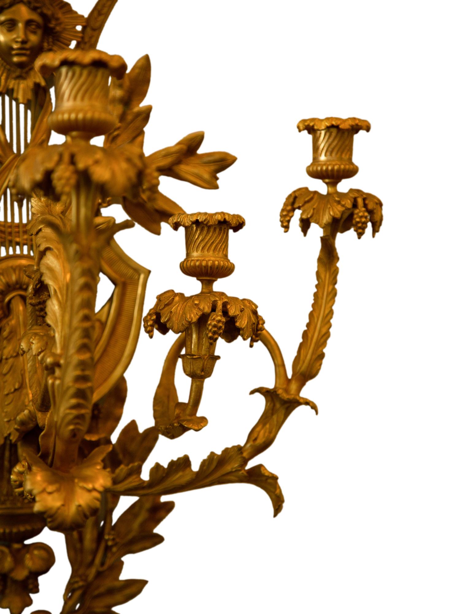 A Set of Four Louis XVI Style Gilt Bronze Five-Light Sconces