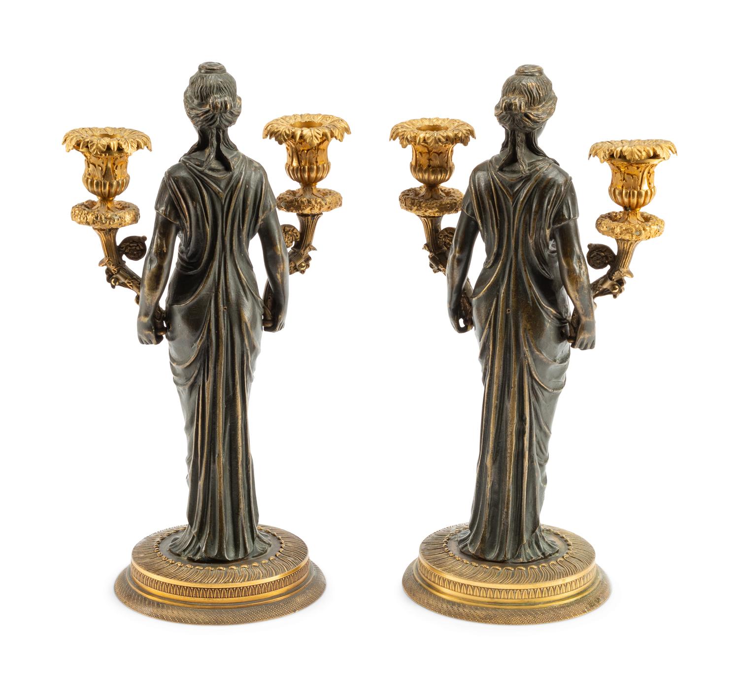 A Pair of Empire Style Gilt and Patinated Bronze Figural Two-Light Candelabra