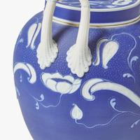 A Wedgwood Harry Barnard (1862-1933) Tricolor Jasperware Vase and Cover UK, early 20th century