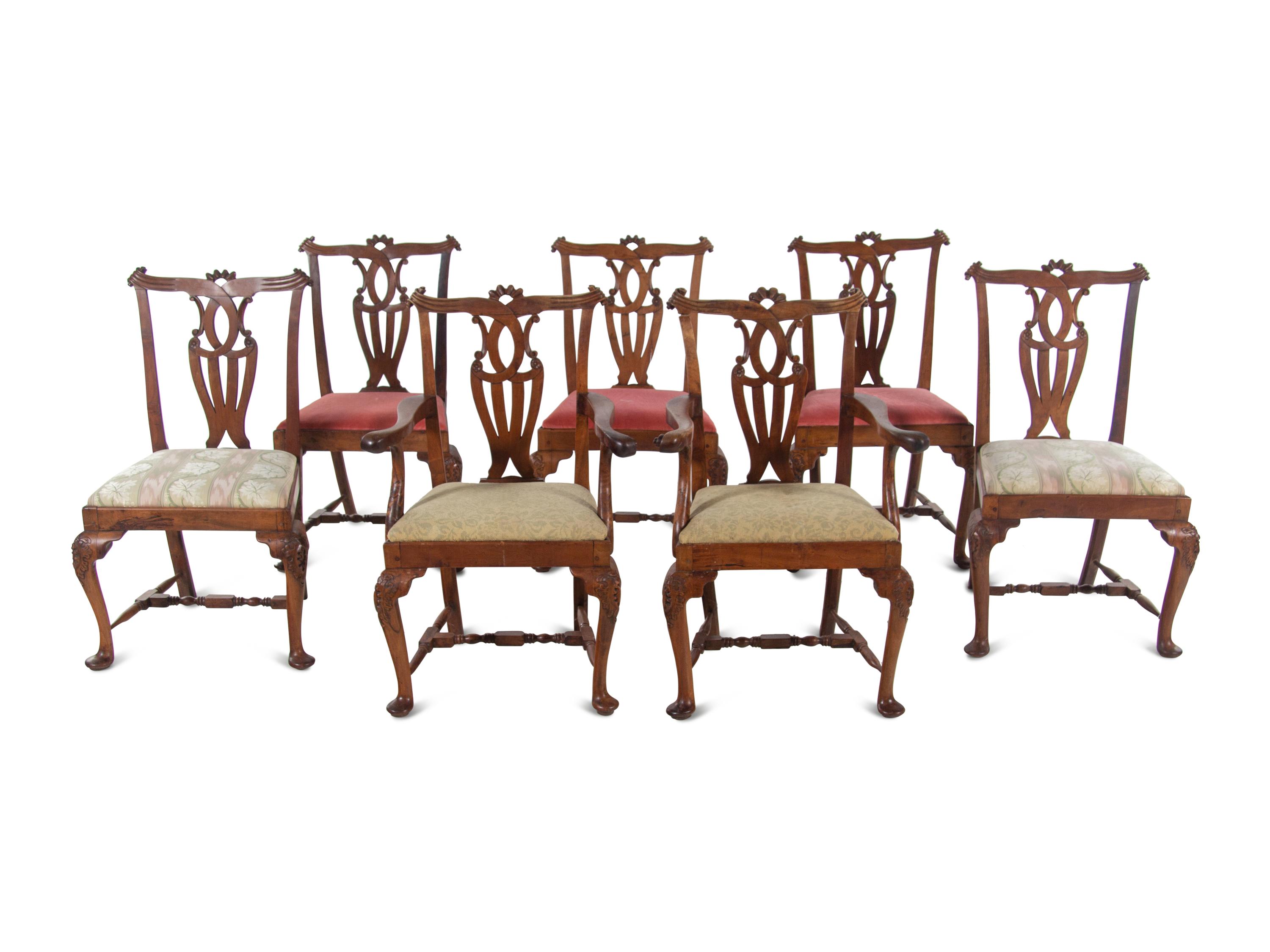 A Set of Seven George III Walnut Dining Chairs