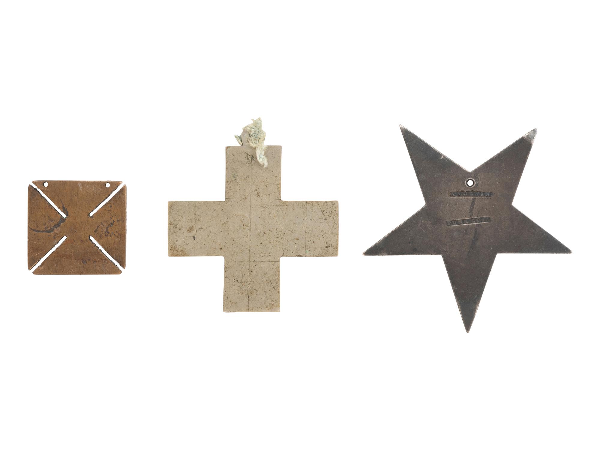 [MILITARIA]. Three Corps badges, one inscribed "Co. D, Dead Shot."