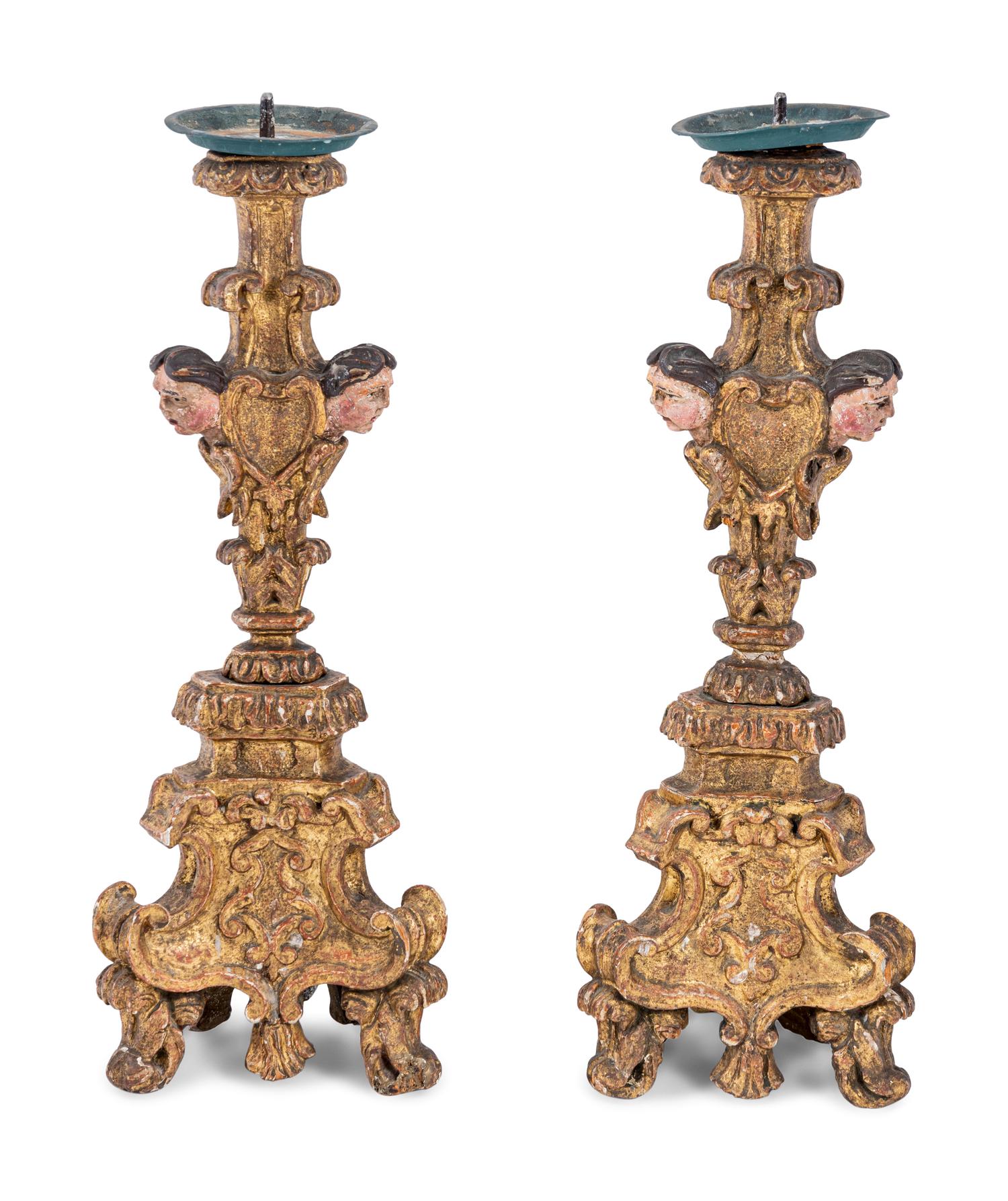 A Pair of Italian Baroque Gilt and Polychromed Pricket Sticks