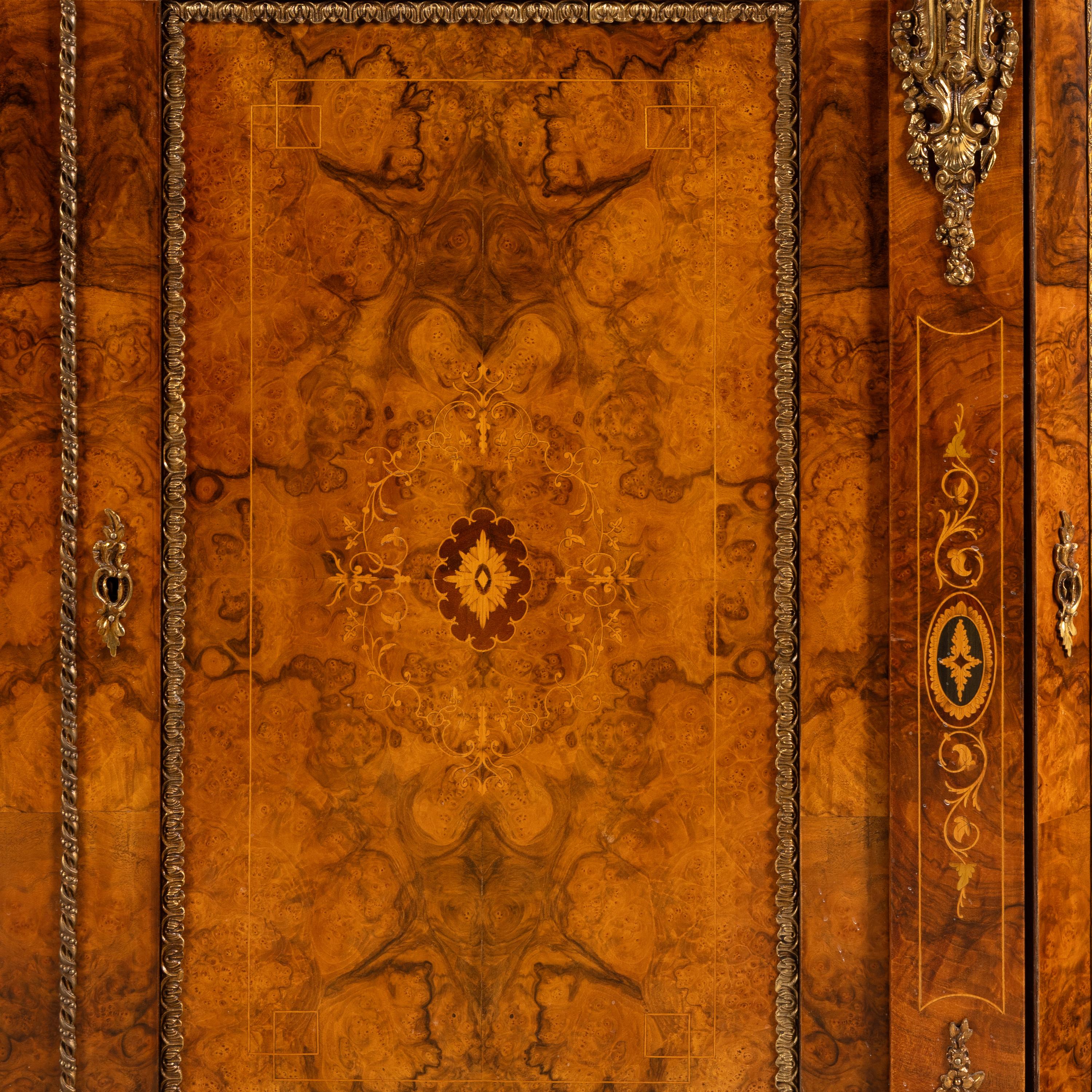 An English Walnut, Marquetry and Gilt Bronze Mounted Console Cabinet