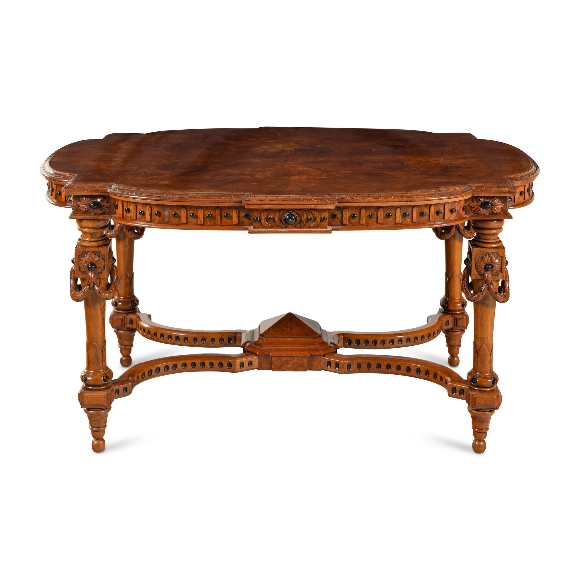 An English Walnut and Part Ebonized Center Table