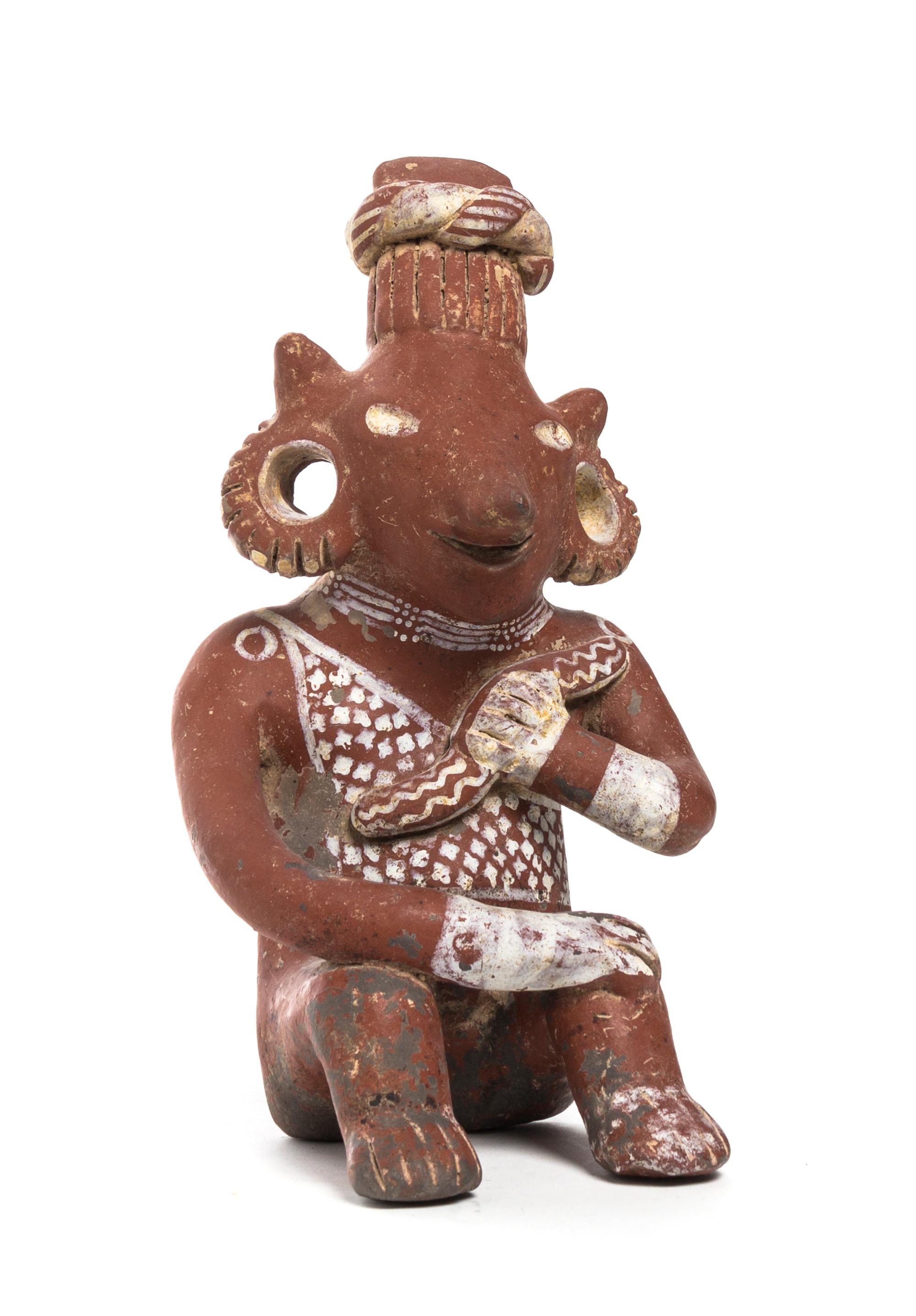 A Pre-Columbian Terracotta Figure, Jalisco, Height 10 1/2 inches.