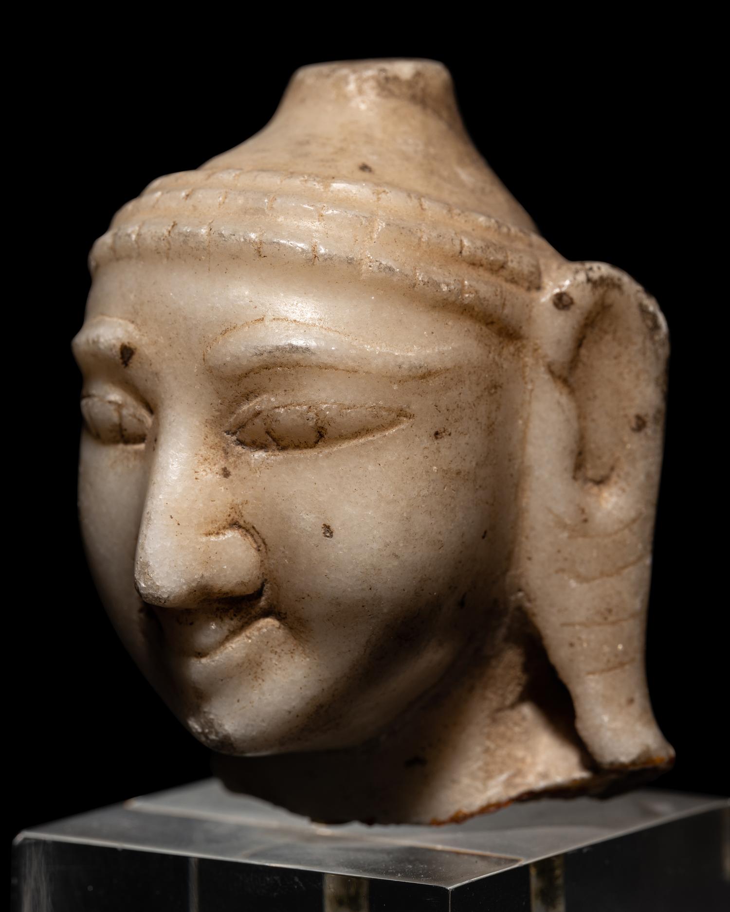 Three Indian White Marble Heads of Deities