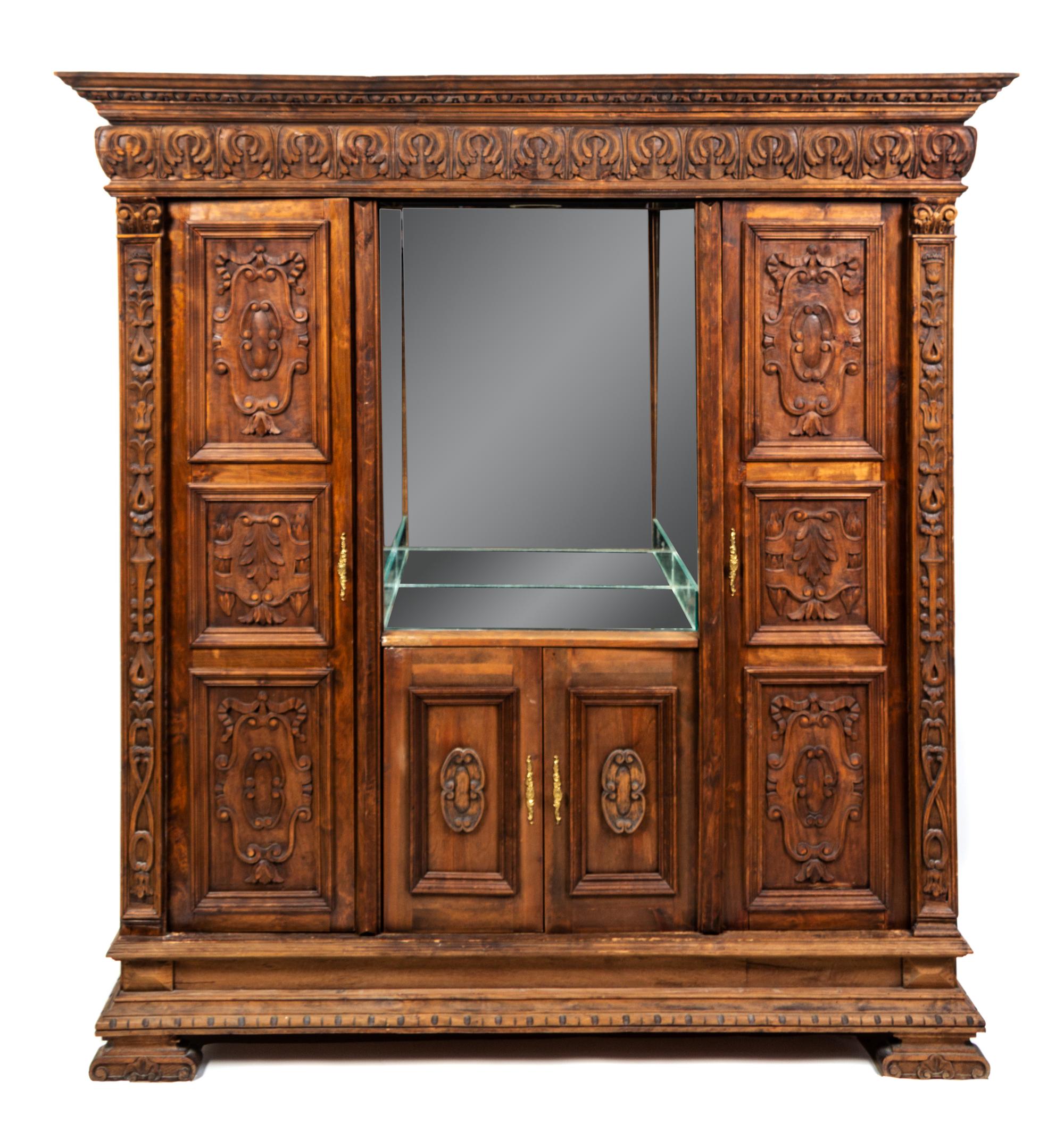 A Flemish Carved Oak Cabinet Height 84 x width 78 x depth 22 inches. — 19TH CENTURY AND LATER