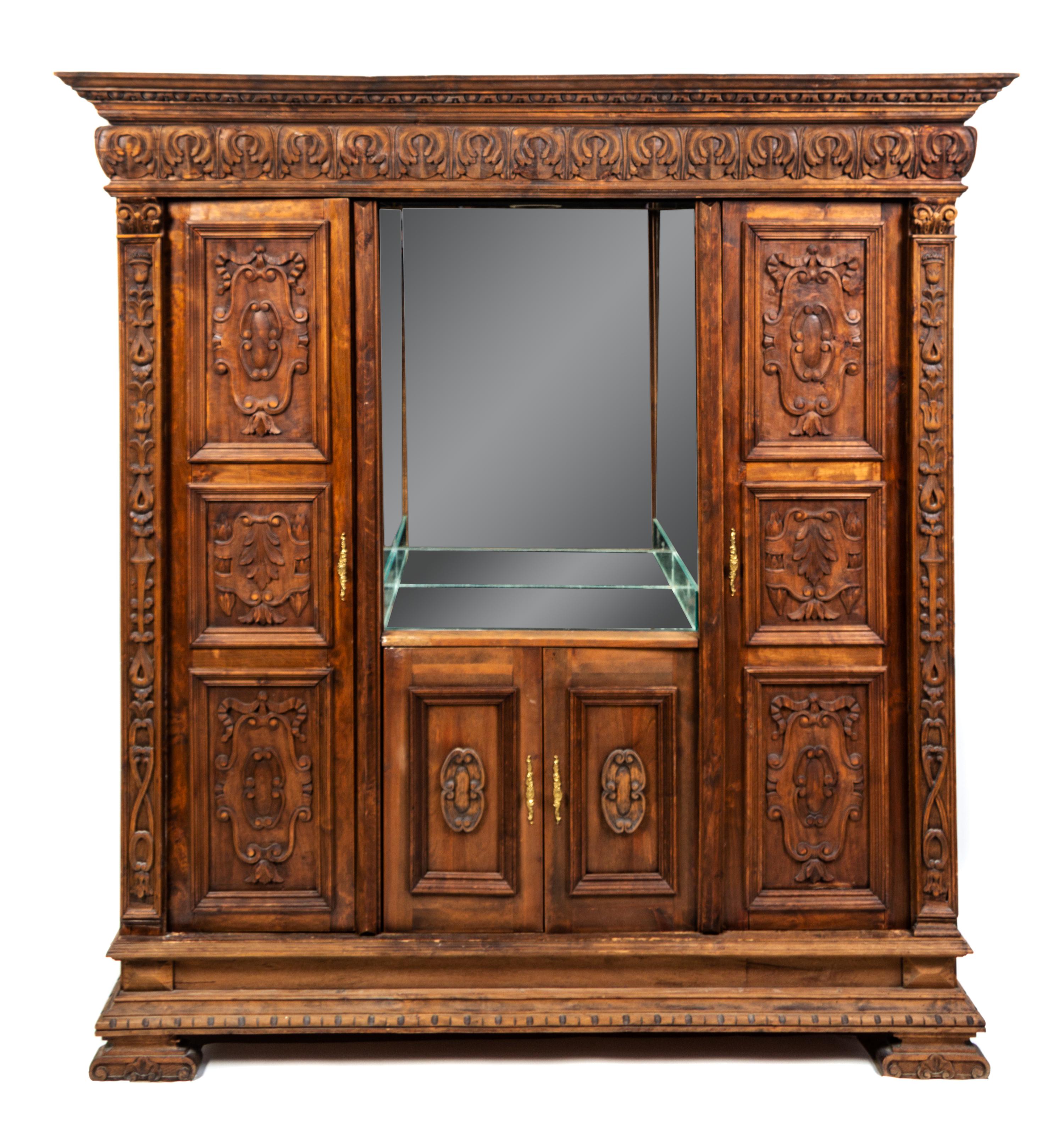 A Flemish Carved Oak Cabinet Height 84 x width 78 x depth 22 inches. — 19TH CENTURY AND LATER