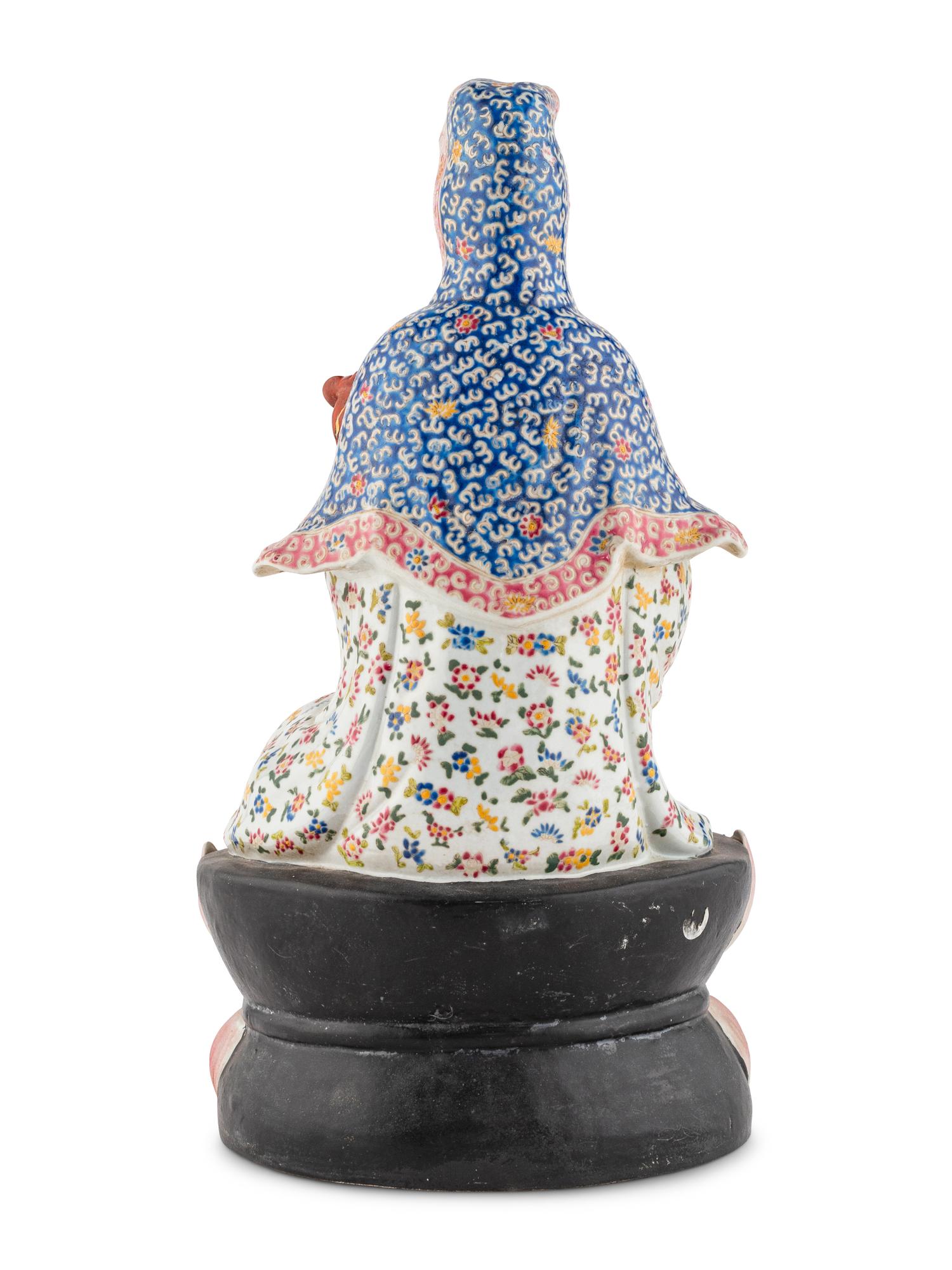 A Chinese Famille Rose Porcelain Figure of Guanyin
