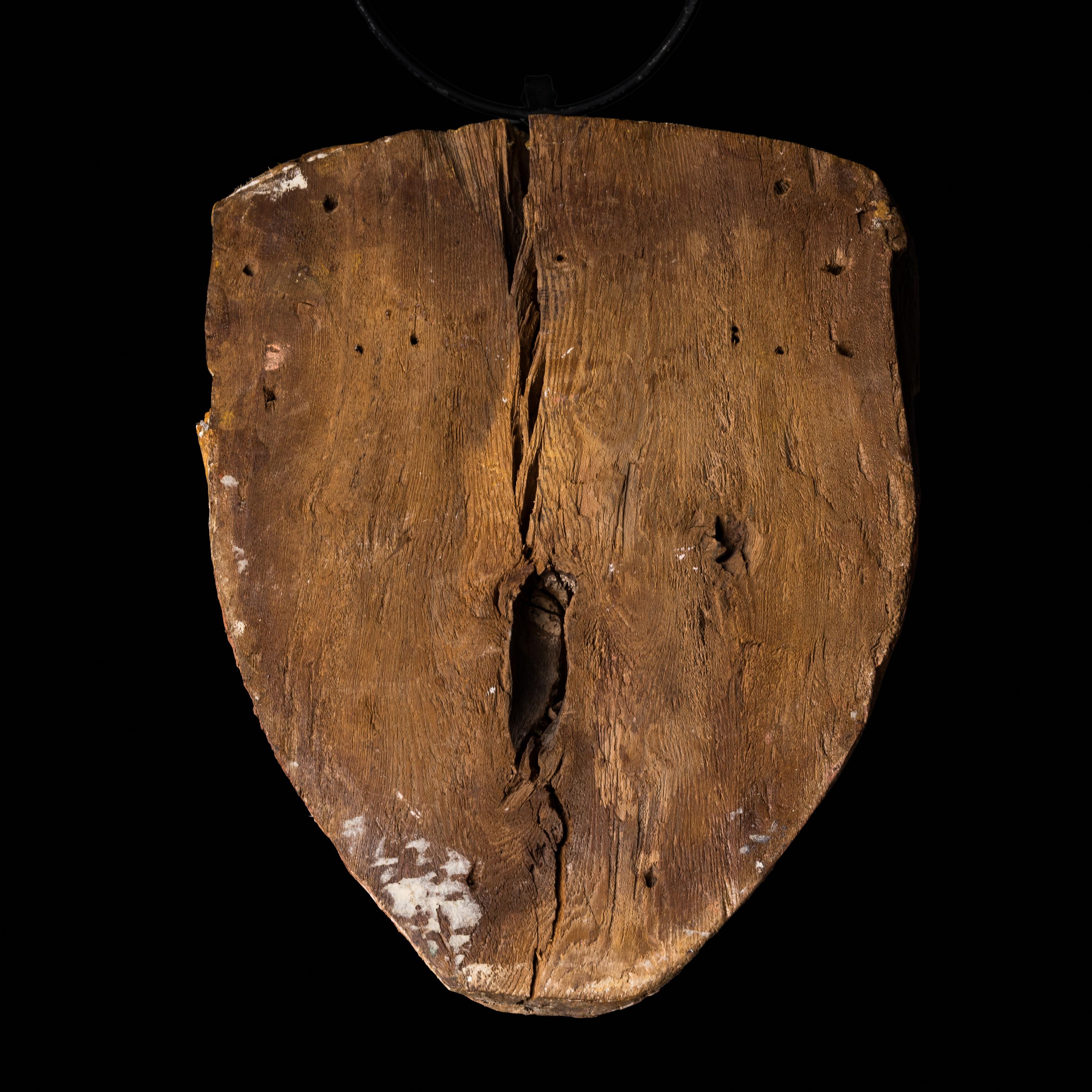 An Egyptian Polychrome Wood Mummy Mask with Bronze Inlays | Freeman's