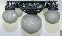An Art Deco Iron and Glass Ceiling Fixture, Muller Freres Width 30 inches.