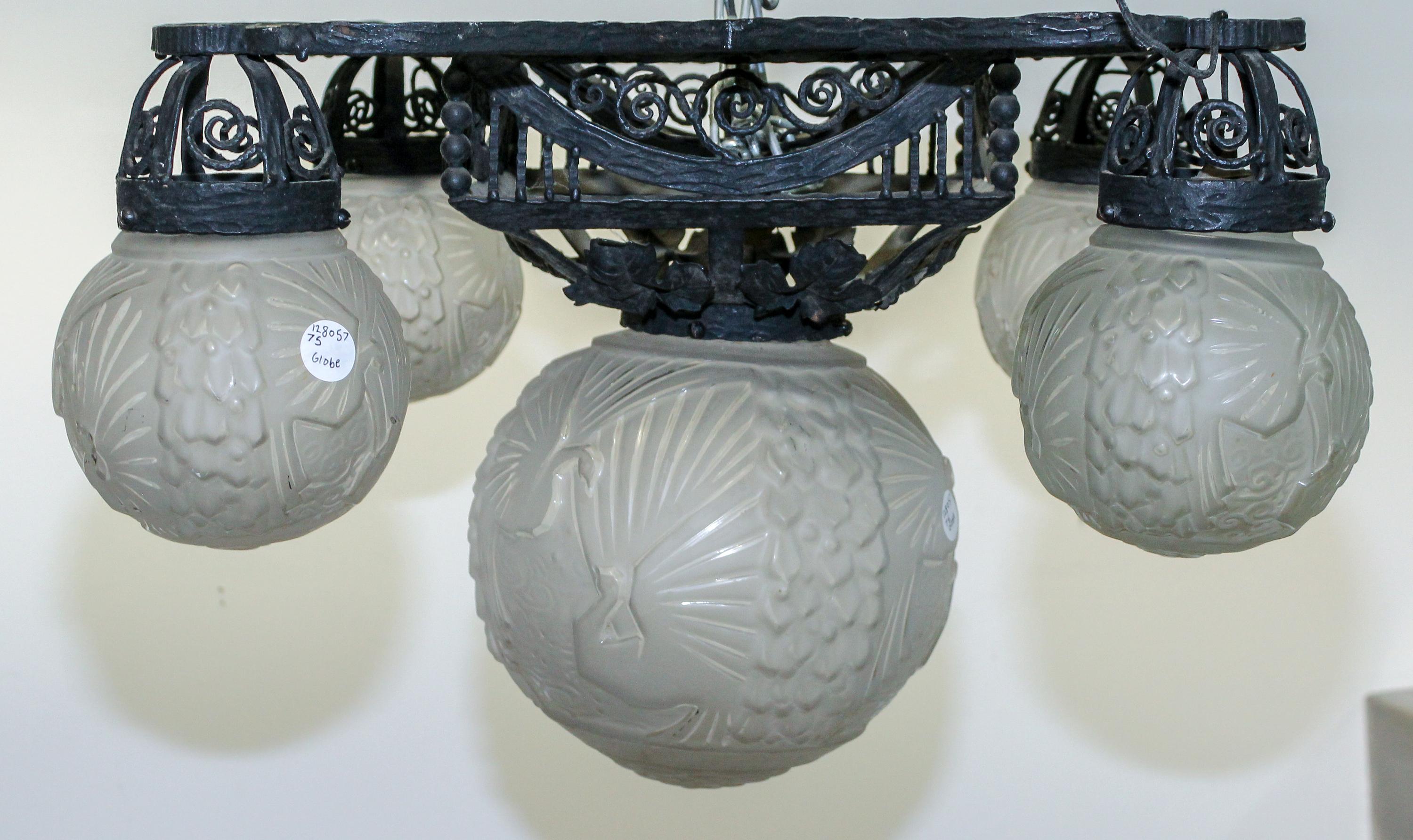 An Art Deco Iron and Glass Ceiling Fixture, Muller Freres Width 30 inches.