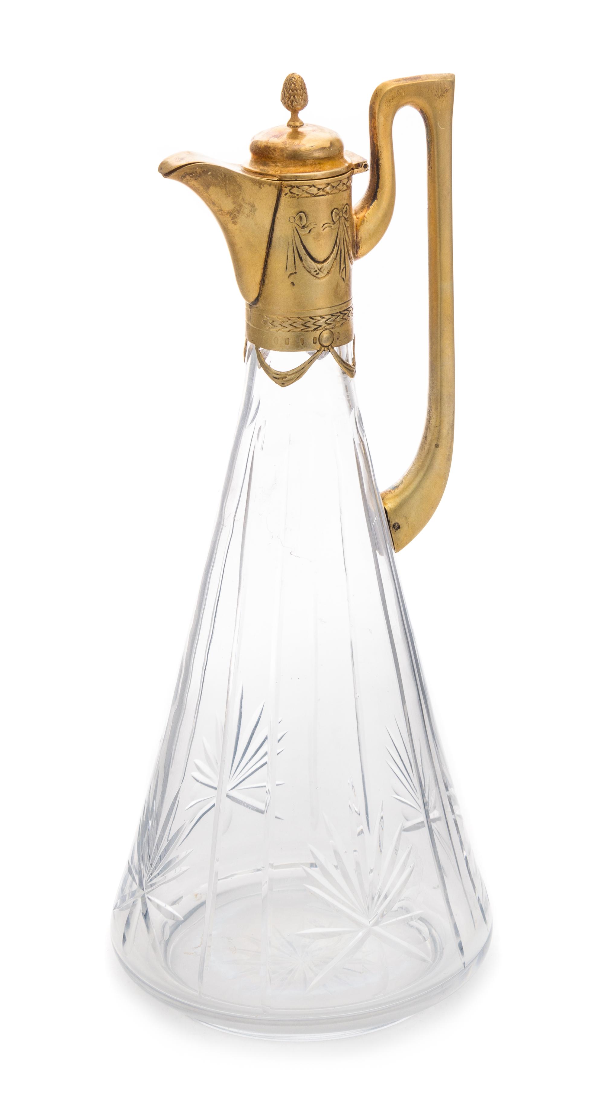A Russian Silver-Gilt Mounted Cut Glass Ewer, Mark of Ivan Khlebnikov with Imperial Warrant, Moscow, Late 19th Century, the hinged lid