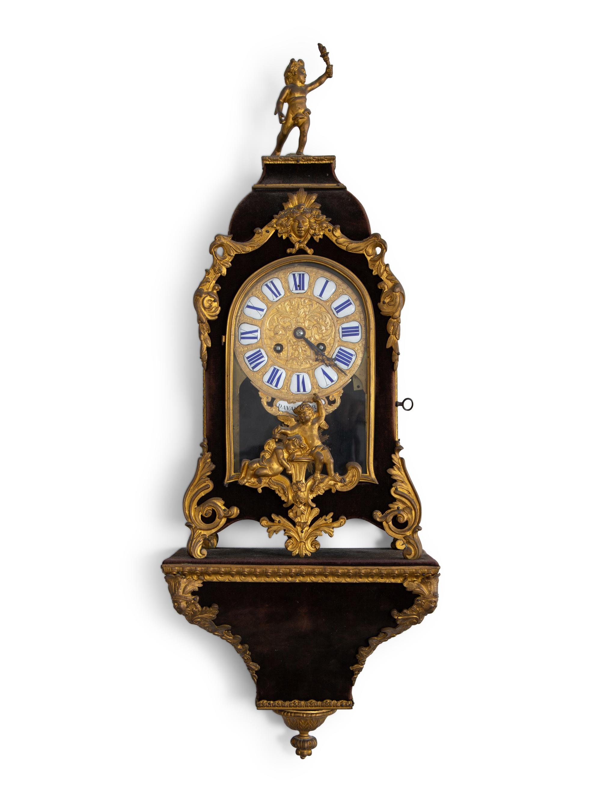 A Louis XV Style Gilt Bronze and Velvet Bracket Clock