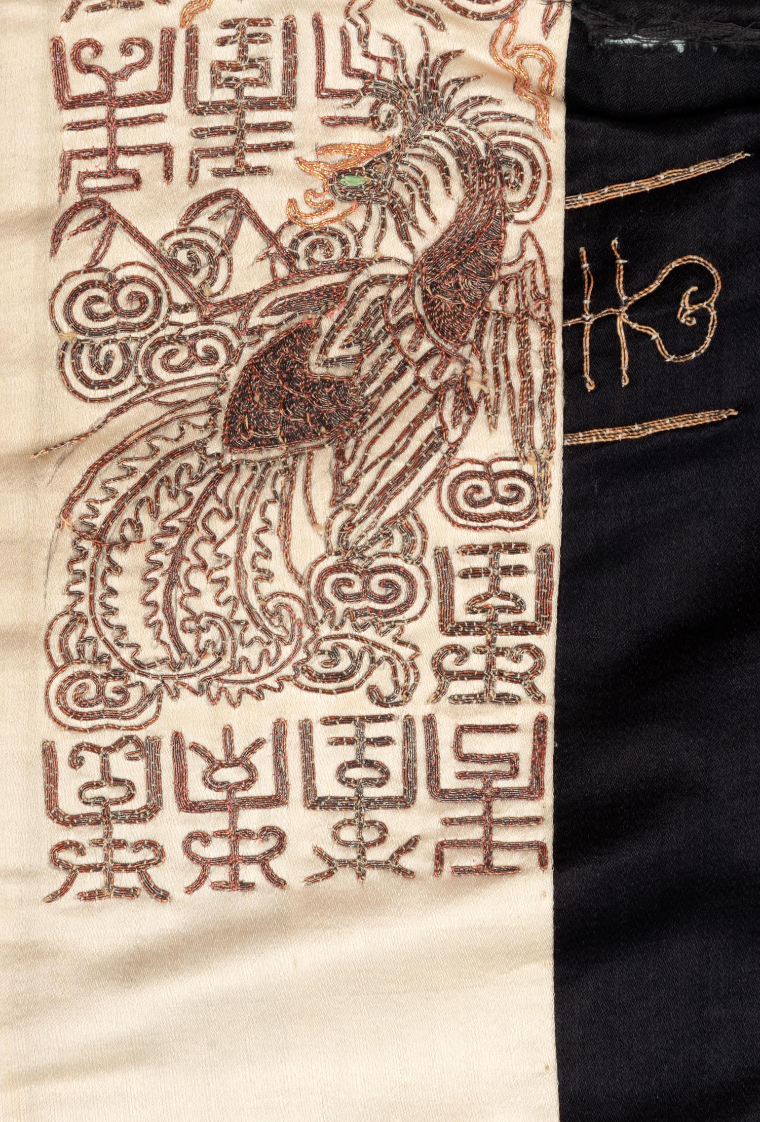 A Midnight Blue Ground Embroidered Silk Lady's Informal Robe