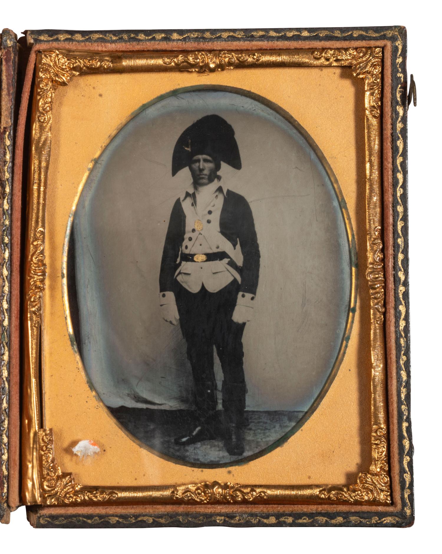 [MILITIA]. Tintype of a militiaman wearing a Rev. War Continental-style tailcoat & cocked hat.