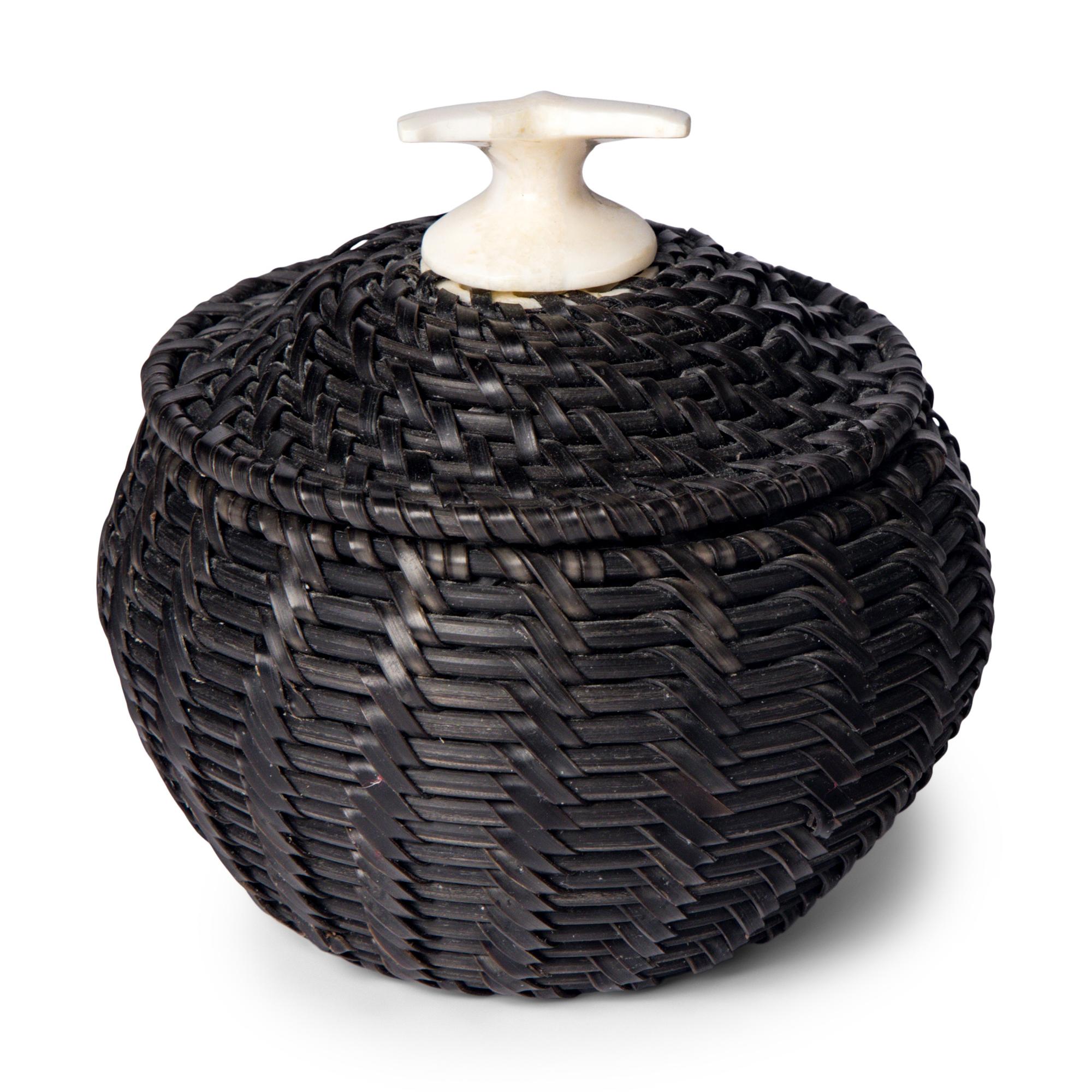 James Omnik (Iñupiaq, 20th century) — Baleen Basket, with Whale Tail Finial