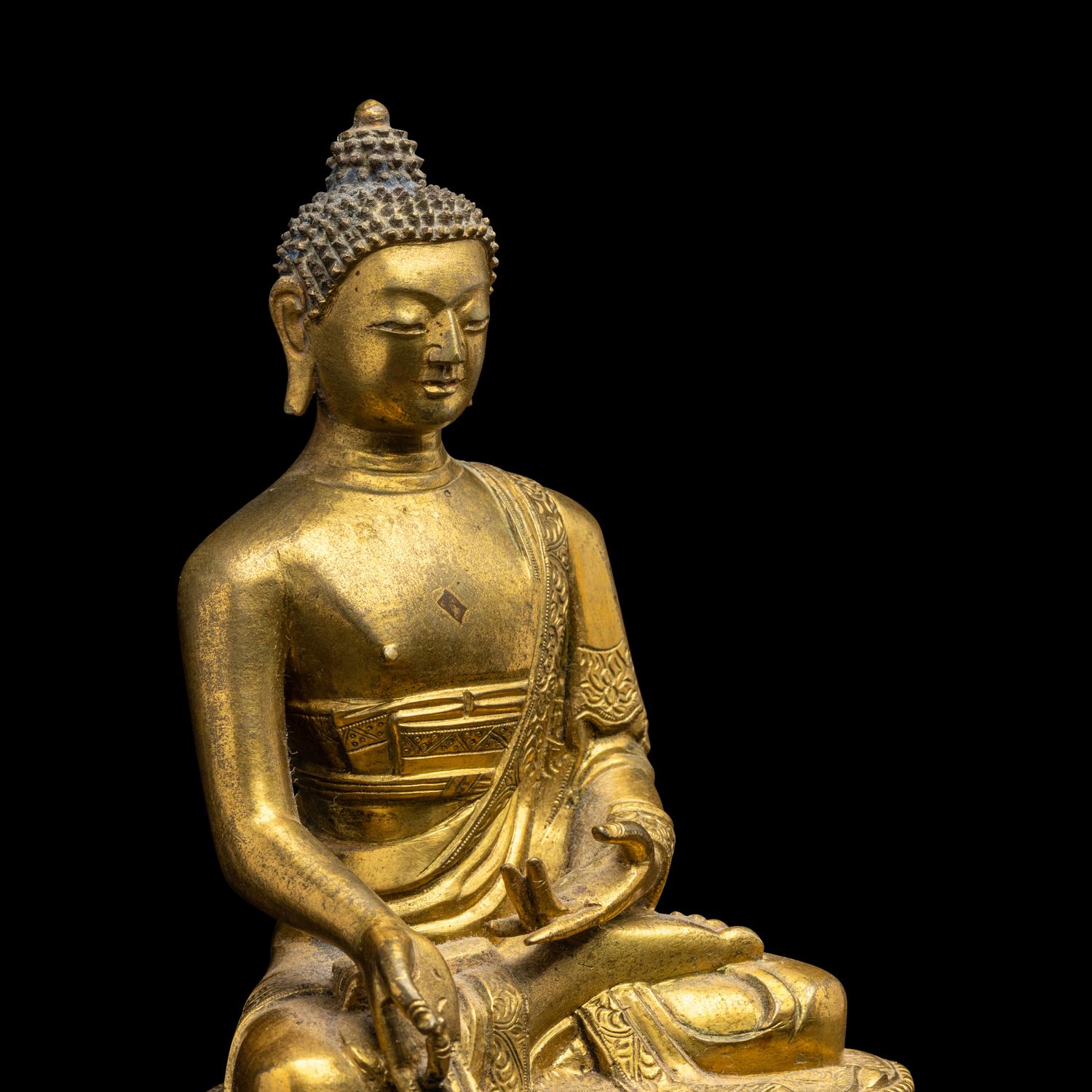 A Sino-Tibetan Gilt Bronze Figure of Buddha 銅鎏金釋迦牟尼坐像