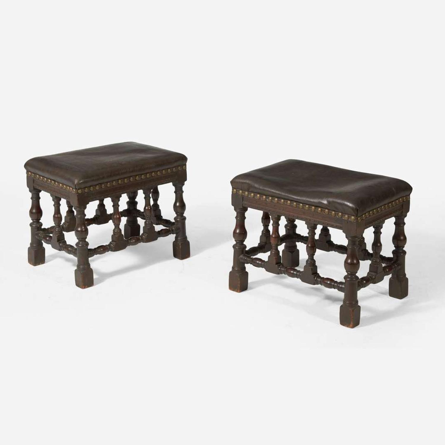 A pair of Baroque Revival carved walnut stools late 19th / early 20th century, possibly incorporating earlier elements