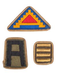 [WORLD WAR II]. Photo album and insignia belonging to an African American soldier.