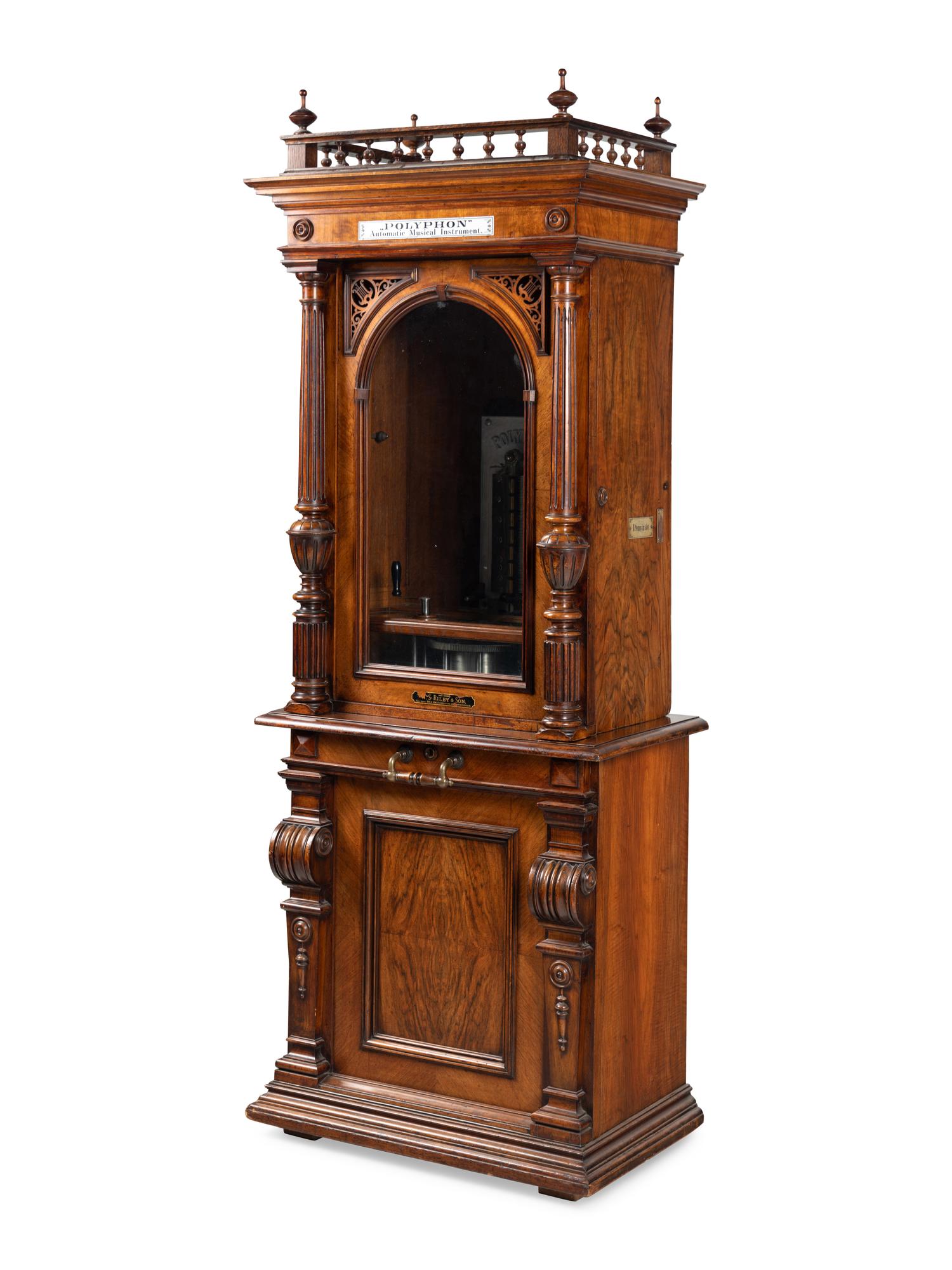 A Polyphon Mikado 24 1/2 Inch Upright Disk Music Box