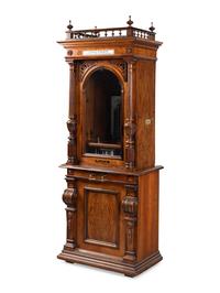 A Polyphon Mikado 24 1/2 Inch Upright Disk Music Box