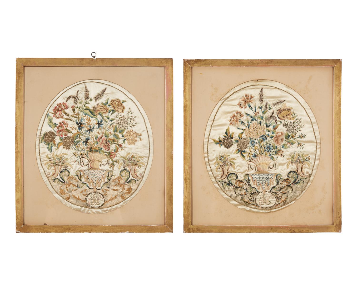 A pair of George III embroidered silk pictures of floral urns, circa 1780
