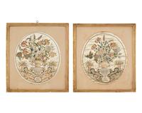A pair of George III embroidered silk pictures of floral urns, circa 1780
